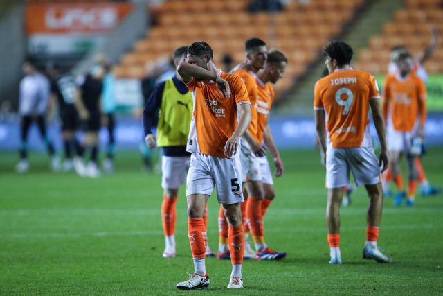 Matthew Pennington of Blackpool reacts to his team's loss after the Carabao Cup match Blackpool vs Sheffield Wednesday at Bloomfield Road, Blackpool, United Kingdom, 17th September 2024

(Photo by Gareth Evans/News Images)