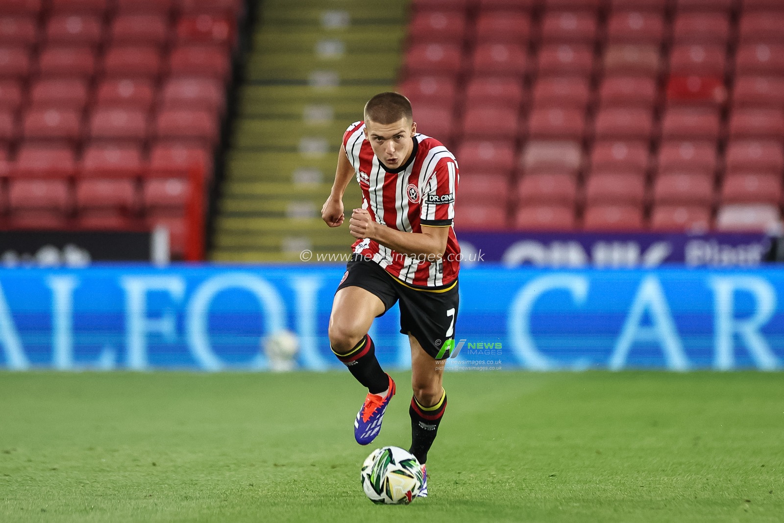Alfie Gilchrist of Sheffield United breaks with the ball during the Carabao Cup match Sheffield United vs Wrexham at Bramall Lane, Sheffield, United Kingdom, 13th August 2024

(Photo by Mark Cosgrove/News Images)