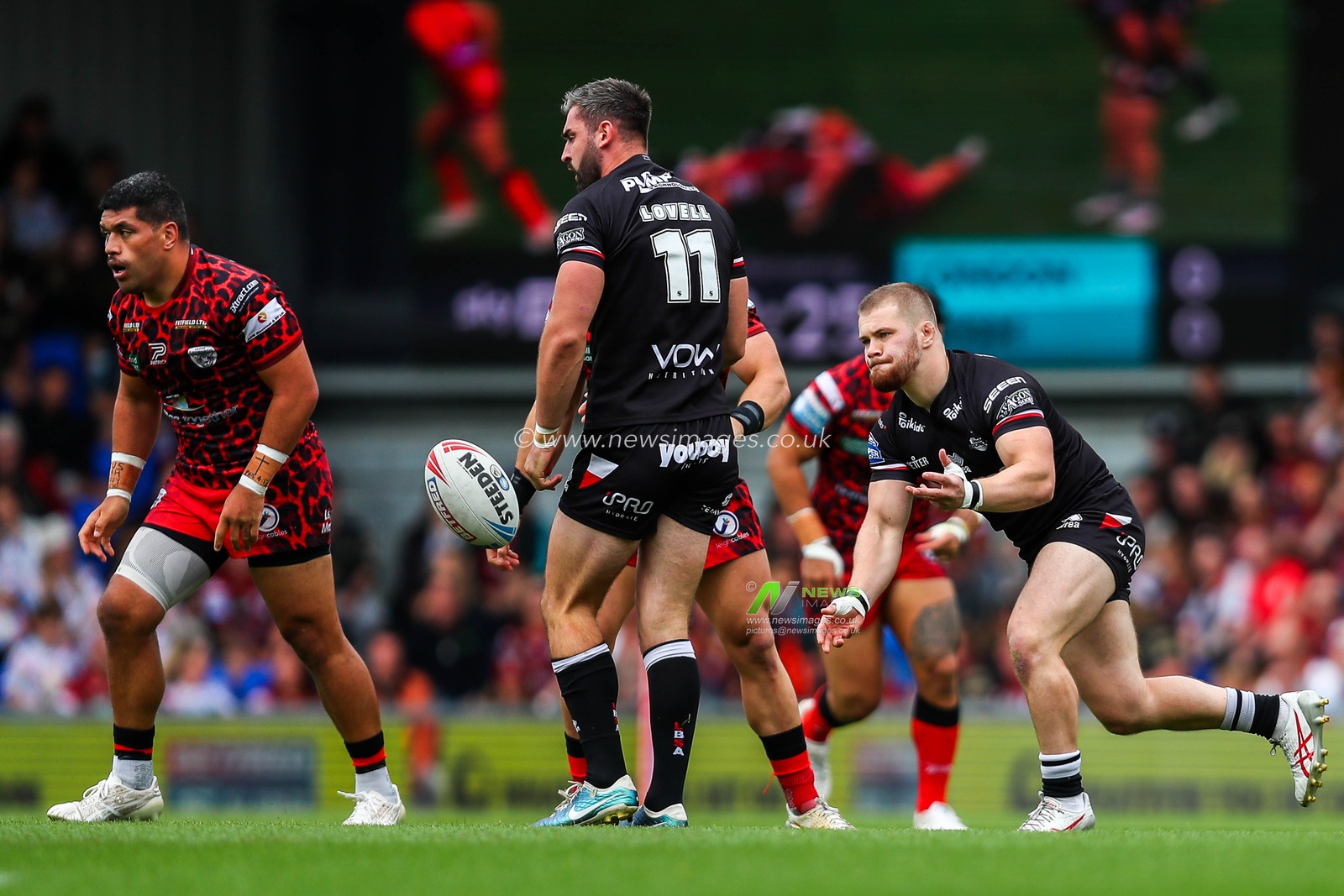 Sam Davis of London Broncos passes the ball during the Betfred Super League Round 23 match London Broncos vs Leigh Leopards at Plough Lane, Wimbledon, United Kingdom, 25th August 2024

(Photo by Izzy Poles/News Images)