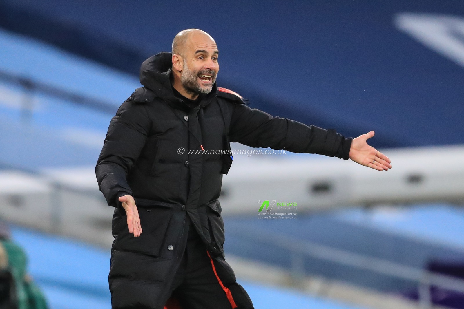 Josep Guardiola manager of Manchester City reacts during the game