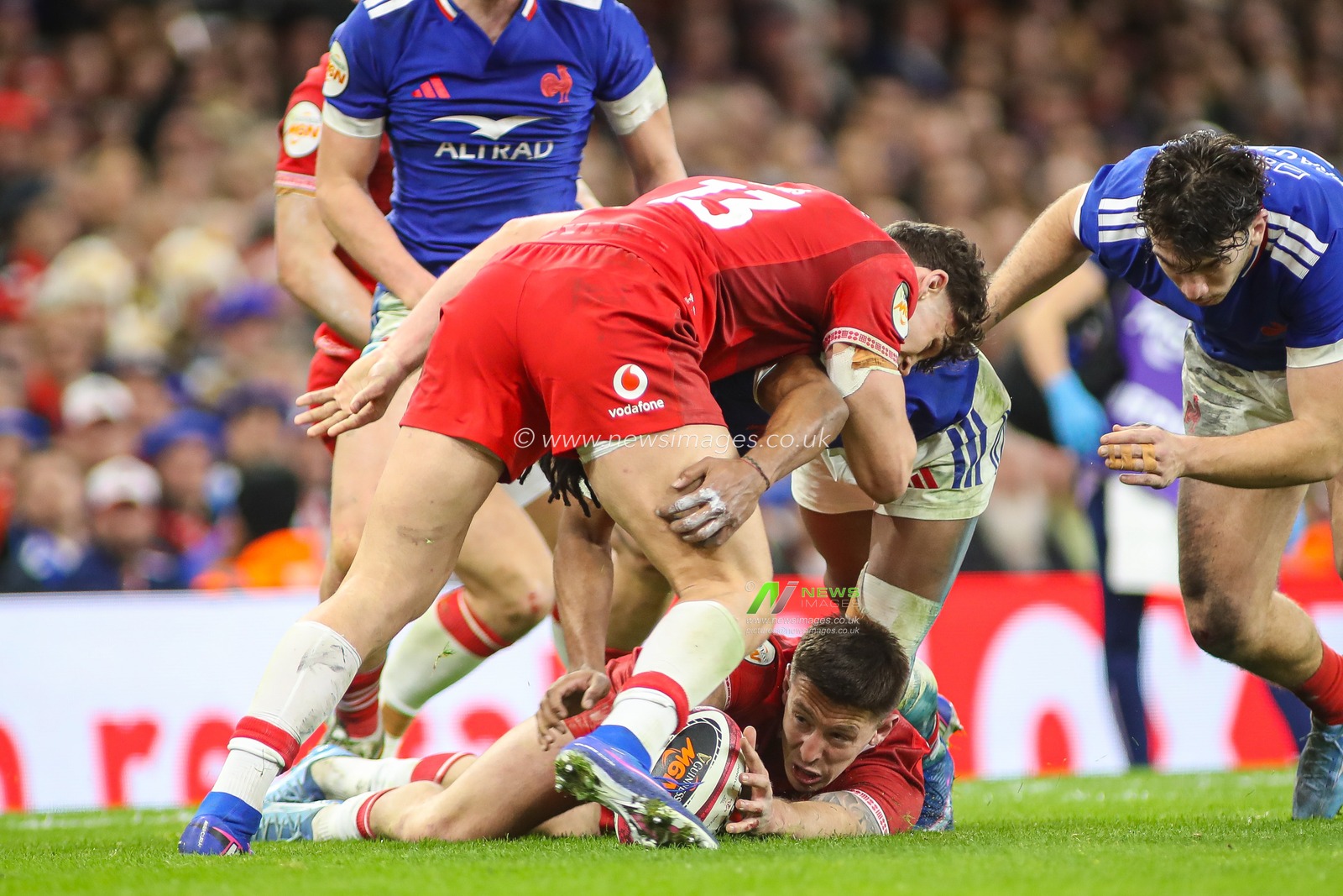 Josh Adams of Wales lays the ball down during the Guinness Six Nations match Wales vs France at Principality Stadium, Cardiff, United Kingdom, 15th February 2026

(Photo by Andrew Lewis/News Images)