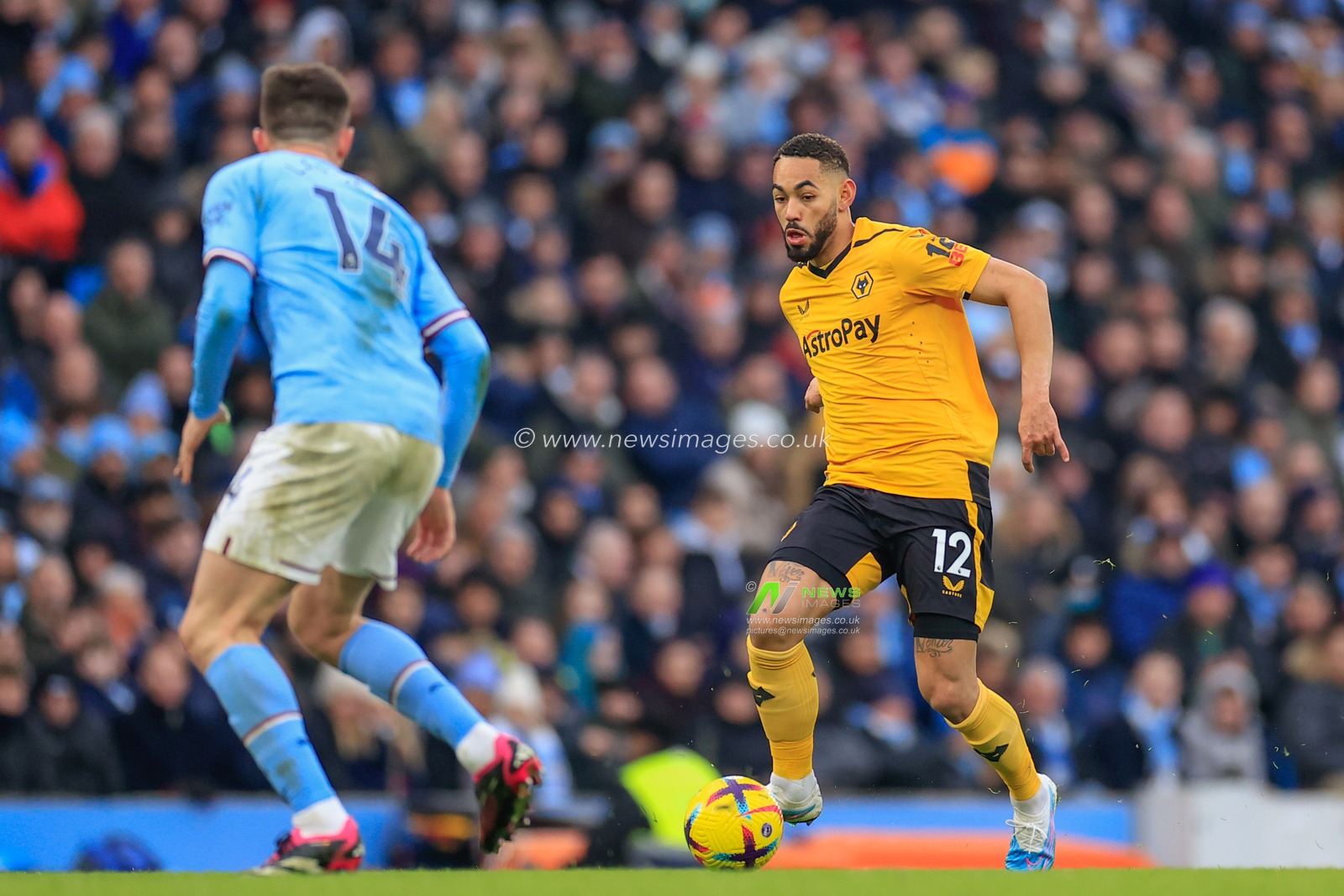 Matheus Cunha #12 of Wolverhampton Wanderers passes the ball during the Premier League match Manchester City vs Wolverhampton Wanderers at Etihad Stadium, Manchester, United Kingdom, 22nd January 2023

(Photo by Conor Molloy/News Images)