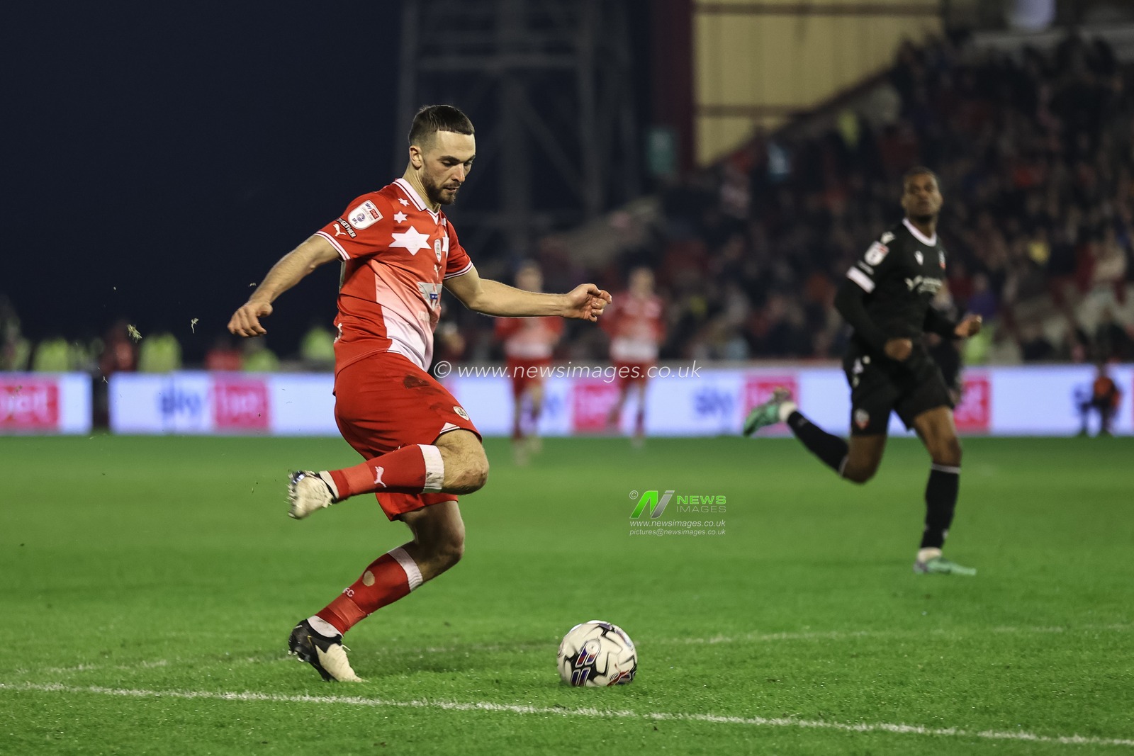 Adam Phillips of Barnsley in action during the Sky Bet League 1 match Barnsley vs Bolton Wanderers at Oakwell, Barnsley, United Kingdom, 5th March 2024

(Photo by Mark Cosgrove/News Images)