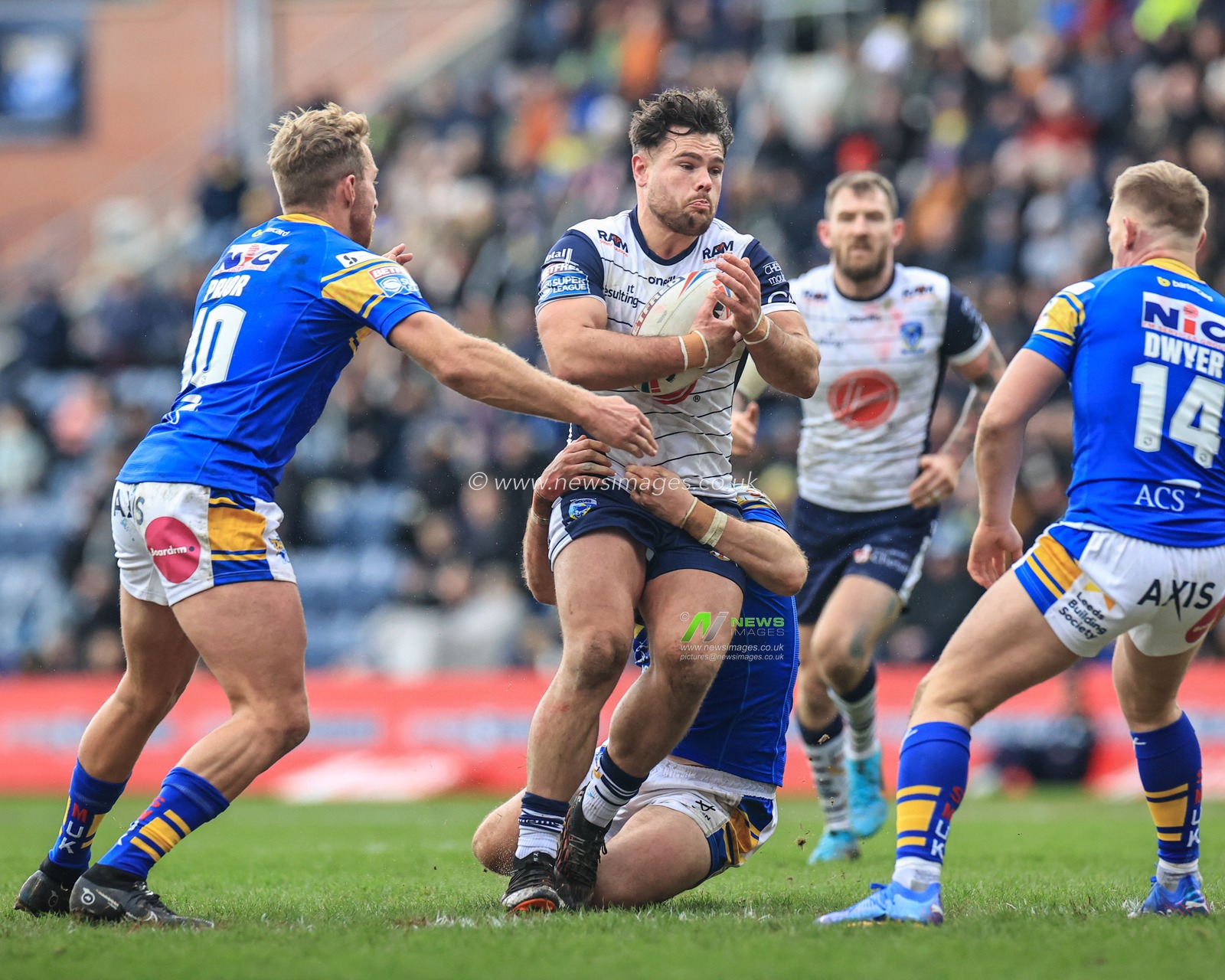 Joe Philbin #8 of Warrington Wolves in action during the game