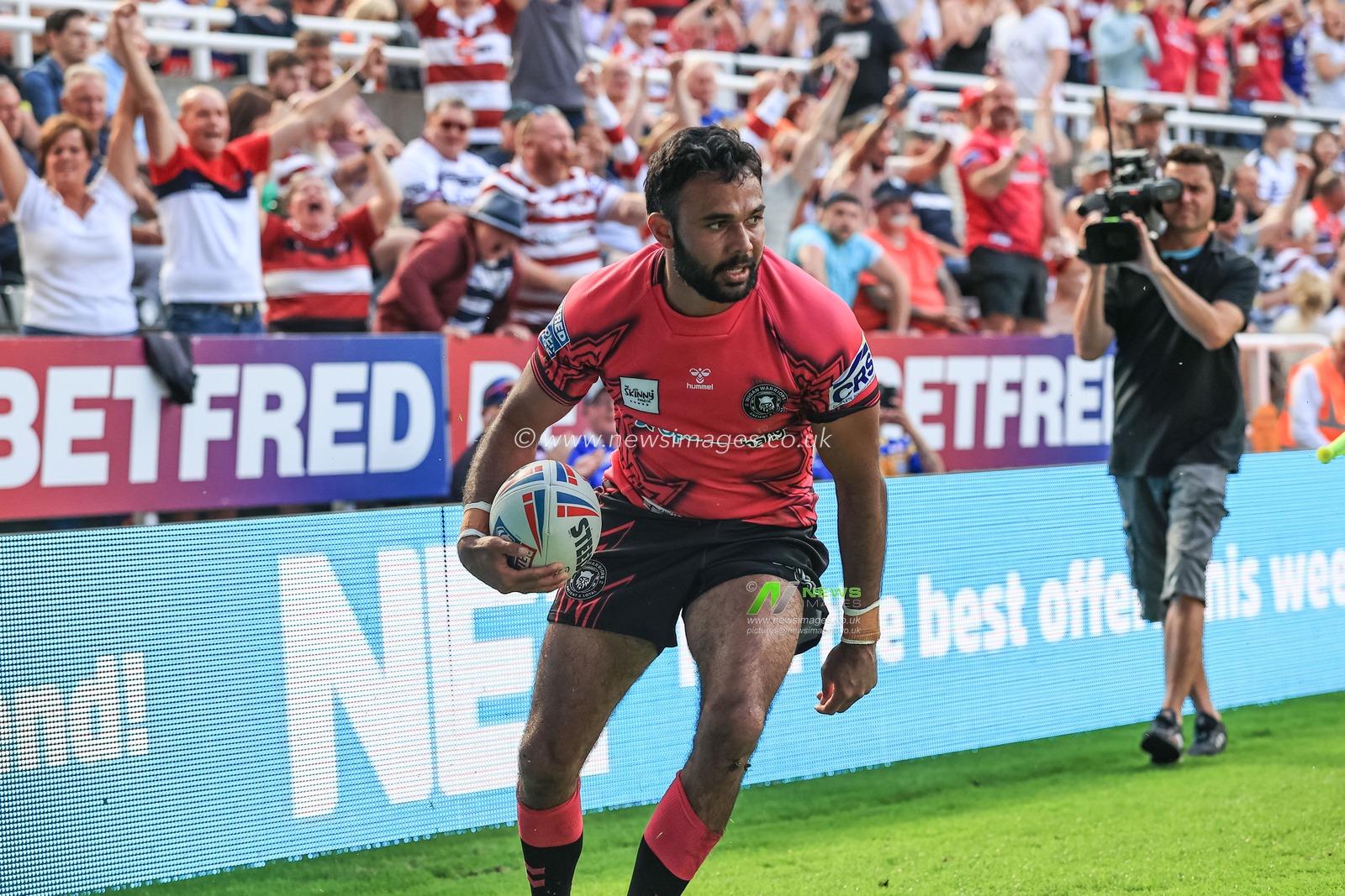 Bevan French #1 of Wigan Warriors celebrates his try
