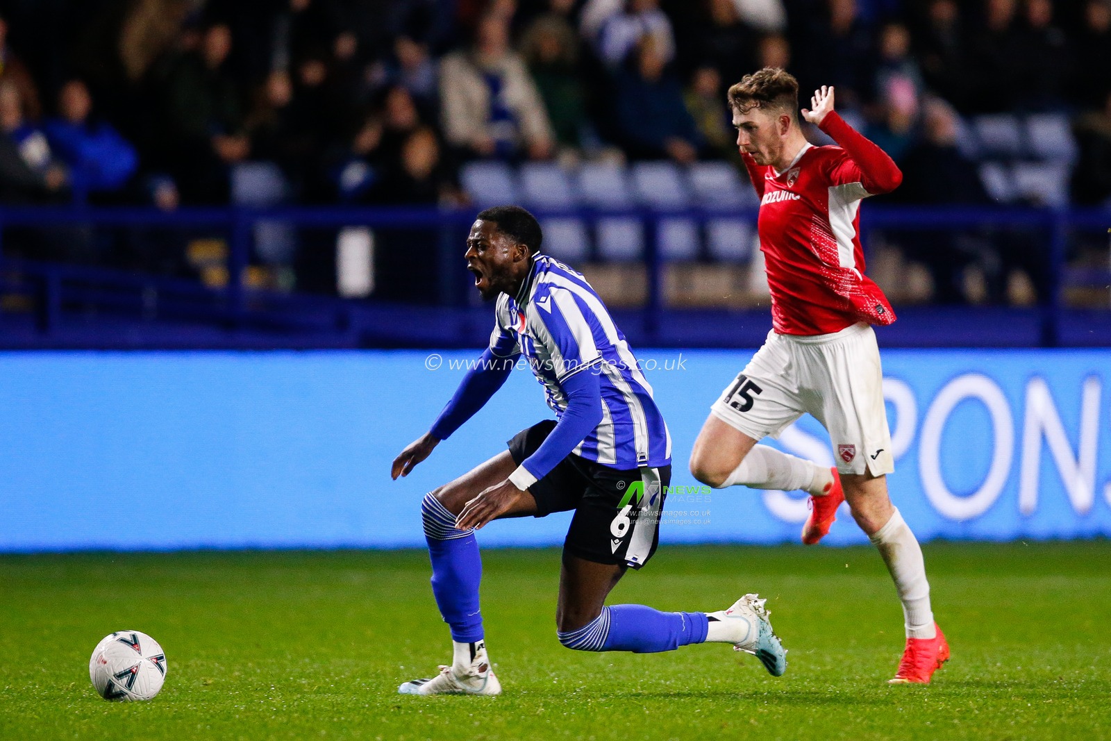 Ryan Delaney #6 of Morecambe fouls Dominic Iorfa #6 of Sheffield Wednesday during the Emirates FA Cup match Sheffield Wednesday vs Morecambe at Hillsborough, Sheffield, United Kingdom, 4th November 2022

(Photo by Ben Early/News Images)