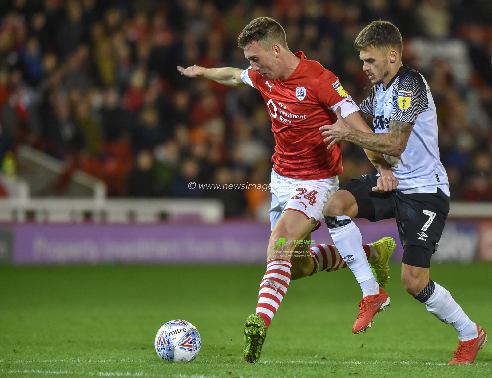 2nd October 2019, Oakwell, Barnsley, England; Sky Bet Championship, Barnsley v Derby County :Aapo Halme (24) of Barnsley FC holds off Jamie Paterson (7) of Derby County

Credit: Dean Williams/News Images