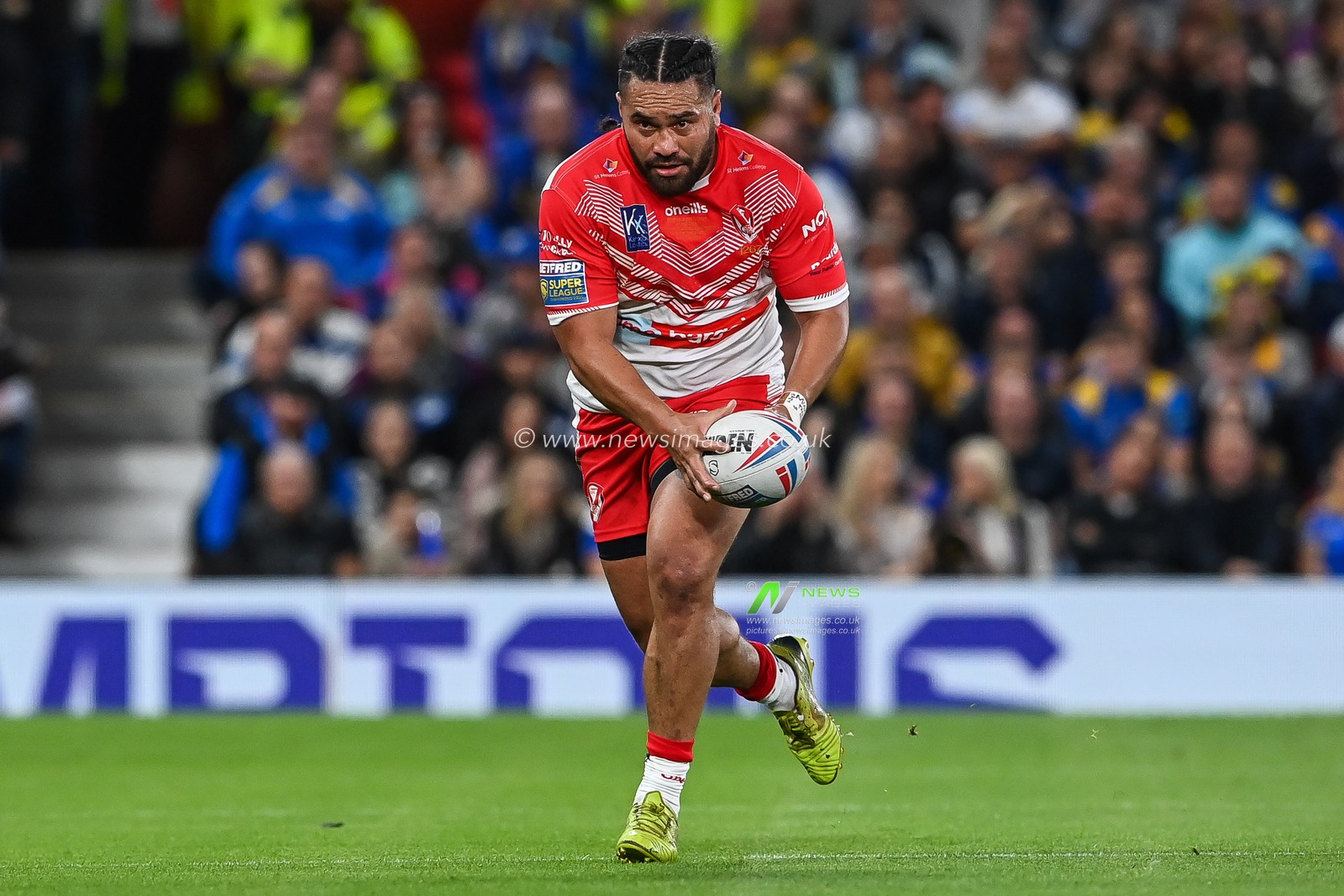 Konrad Hurrell #23 of St Helens makes a break during the 25th Betfred Super League Grand Final match St Helens vs Leeds Rhinos at Old Trafford, Manchester, United Kingdom, 24th September 2022

(Photo by Craig Thomas/News Images)