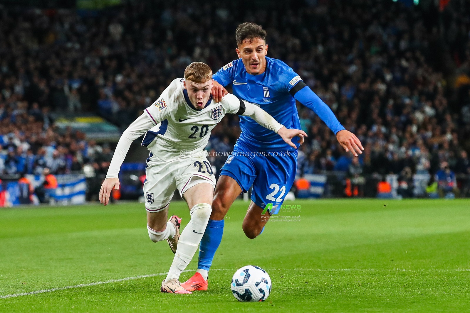 Cole Palmer of England is put under pressure by Dimitris Giannoulis of Greece during the UEFA Nations League - League B - Group B2 - match England vs Greece at Wembley Stadium, London, United Kingdom, 10th October 2024

(Photo by Gareth Evans/News Images)