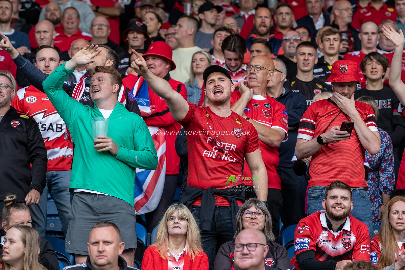 The Salford Red Devils supporters cheer on their team during the Betfred Super League match Huddersfield Giants vs Salford Red Devils at John Smith's Stadium, Huddersfield, United Kingdom, 10th September 2022

(Photo by James Heaton/News Images)