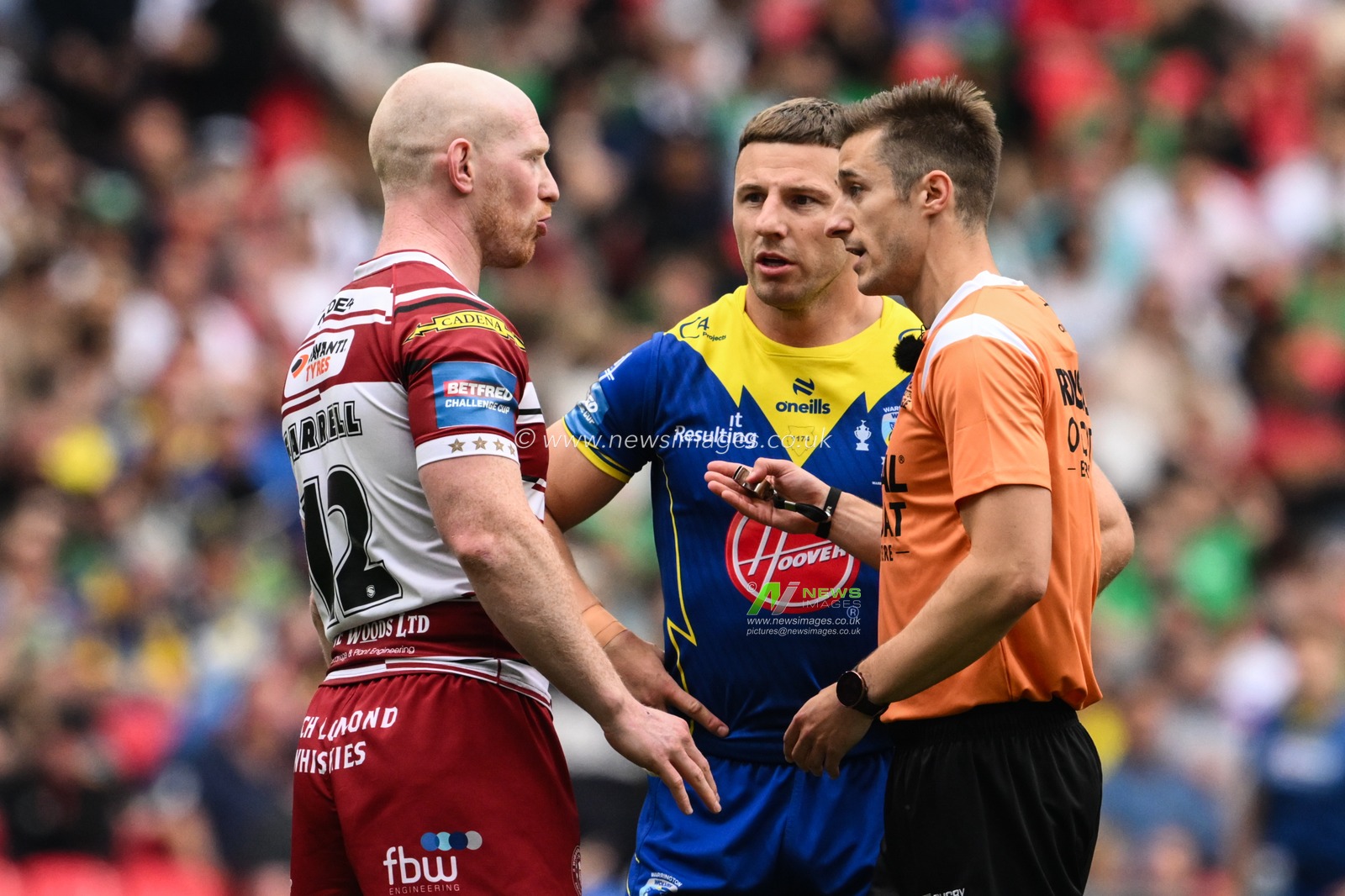 Liam Farrell of Wigan Warriors talks to referee Chris Kendall during the Betfred Challenge Cup Final match Warrington Wolves vs Wigan Warriors at Wembley Stadium, London, United Kingdom, 8th June 2024

(Photo by Craig Thomas/News Images)