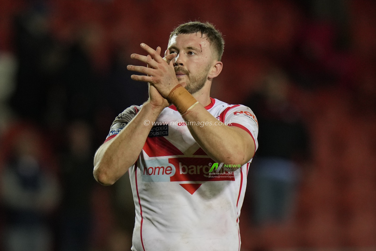 Joe Batchelor of St. Helens salutes the fans after the Betfred Super League  Round 8 match St Helens vs Hull FC at Totally Wicked Stadium, St Helens, United Kingdom, 19th April 2024

(Photo by Steve Flynn/News Images)