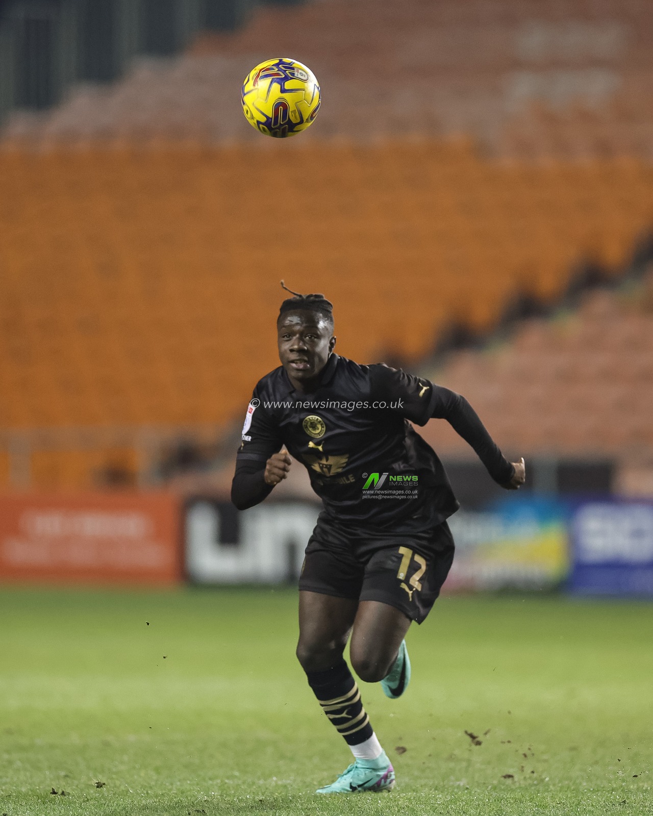 FÃ¡bio JalÃ³ #12 of Barnsley in action during the Bristol Street Motors Trophy match Blackpool vs Barnsley at Bloomfield Road, Blackpool, United Kingdom, 5th December 2023

(Photo by Mark Cosgrove/News Images)