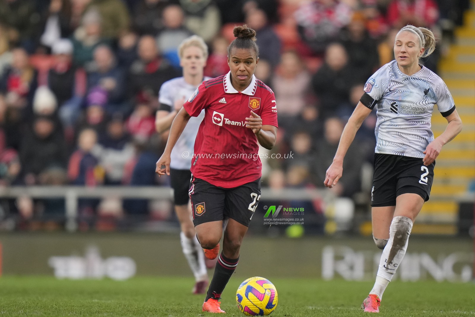 Nikita Parris #22 of Manchester United breaks past Emma Koivisto #2 of Liverpool Women during the The Fa Women's Super League match Manchester United Women vs Liverpool Women at Leigh Sports Village, Leigh, United Kingdom, 15th January 2023

(Photo by Steve Flynn/News Images)