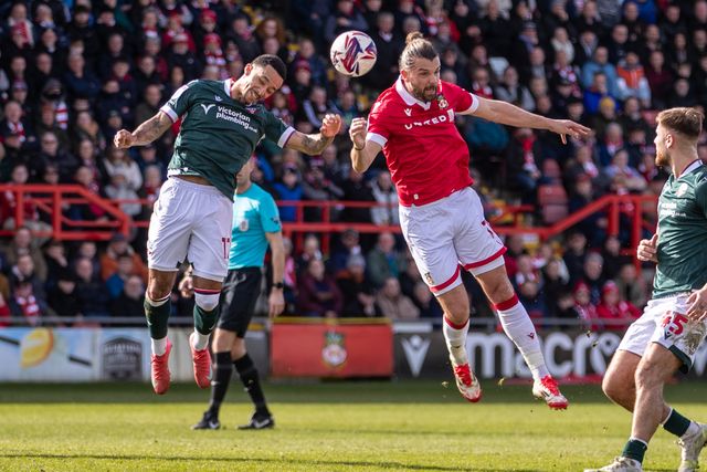 Josh Dacres-Cogley of Bolton Wanderers and Jay Rodriguez of Wrexham AFC battle for the ball during the Sky Bet League 1 match Wrexham vs Bolton Wanderers at SToK Cae Ras, Wrexham, United Kingdom, 1st March 2025

(Photo by Nik Mesney/News Images)