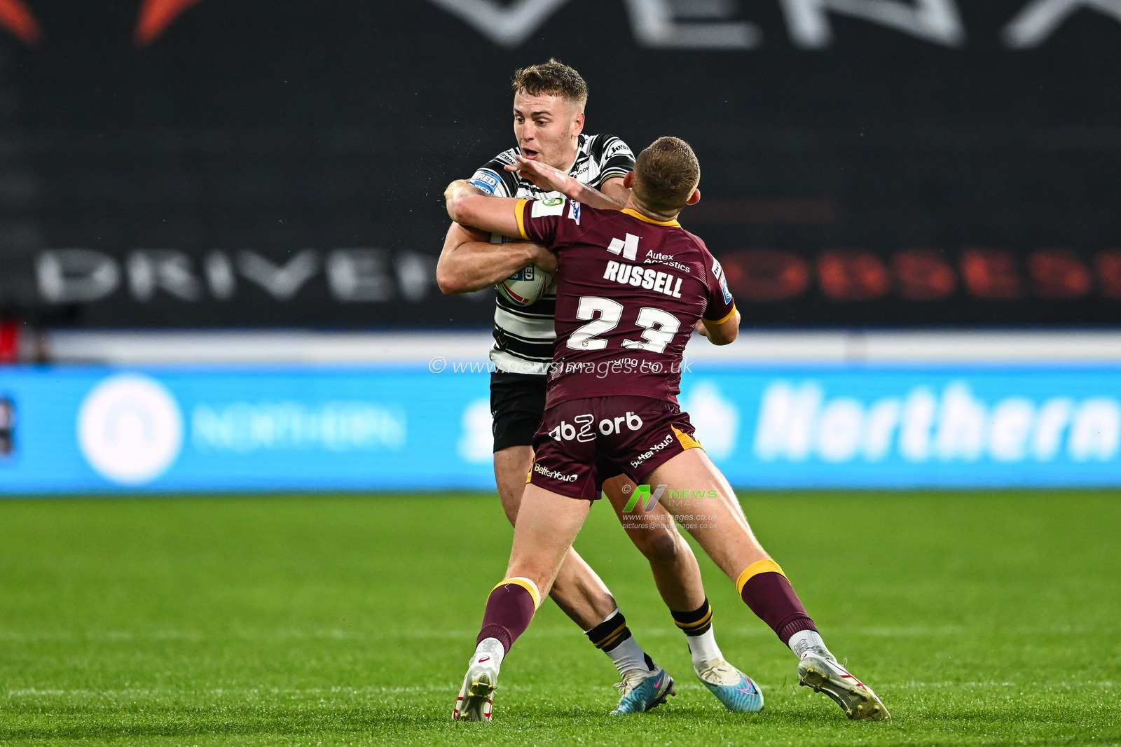 Jake Trueman #6 of Hull FC is tackled by Olly Russell #23 of Huddersfield Giants during the Betfred Super League Round 20 match Huddersfield Giants vs Hull FC at John Smith's Stadium, Huddersfield, United Kingdom, 27th July 2023

(Photo by Craig Thomas/News Images)