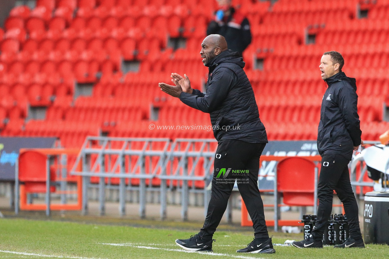 Darren Moore manager of Doncaster Rovers applauds his players