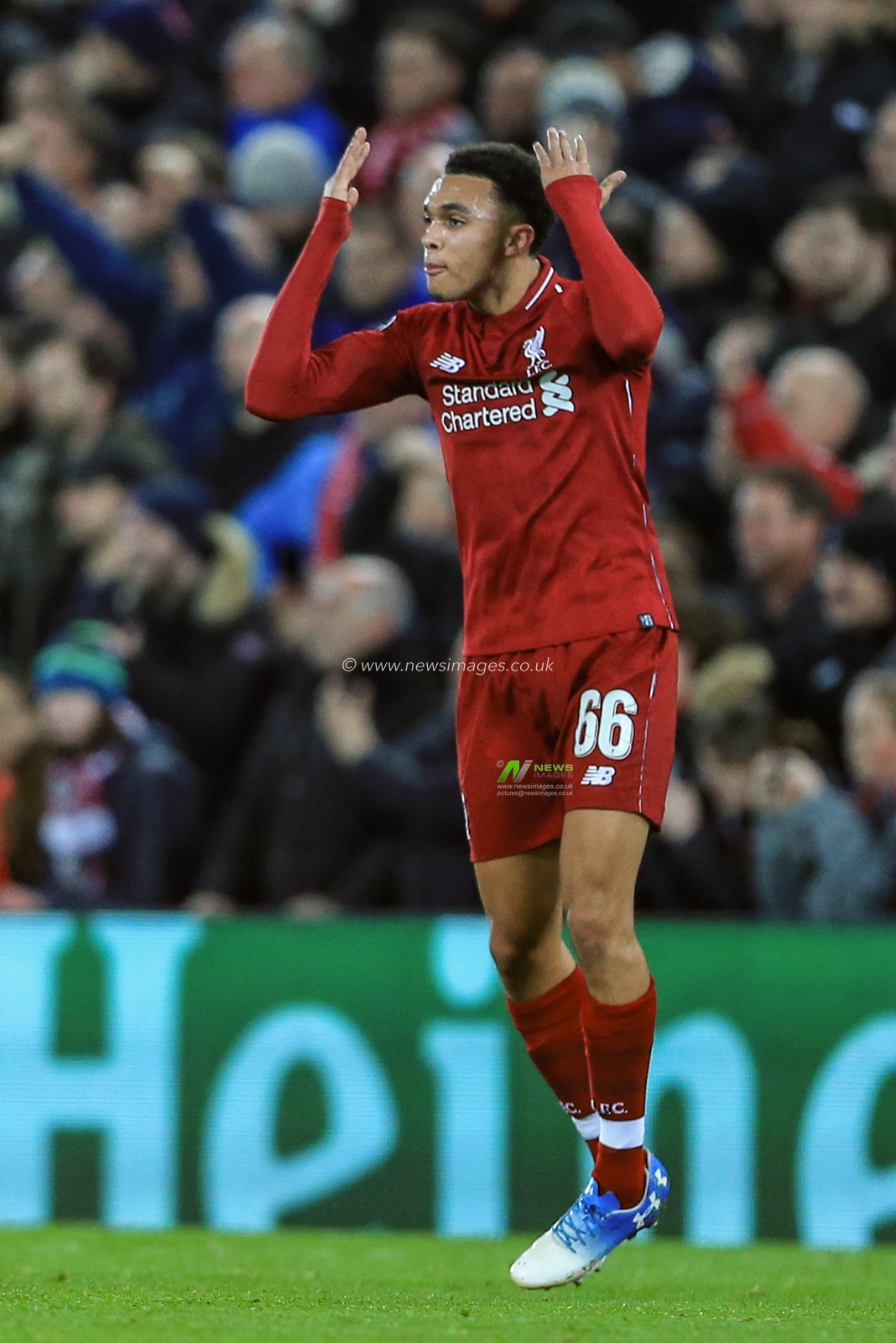 11th December 2018, Anfield, Liverpool, England; UEFA Champions League, Liverpool v Napoli ;  Trent Alexander-Arnold (66) of Liverpool celebrates Mohamed Salah (11) of Liverpool goal to make it 1-0 



  Credit: Mark Cosgrove/News Images