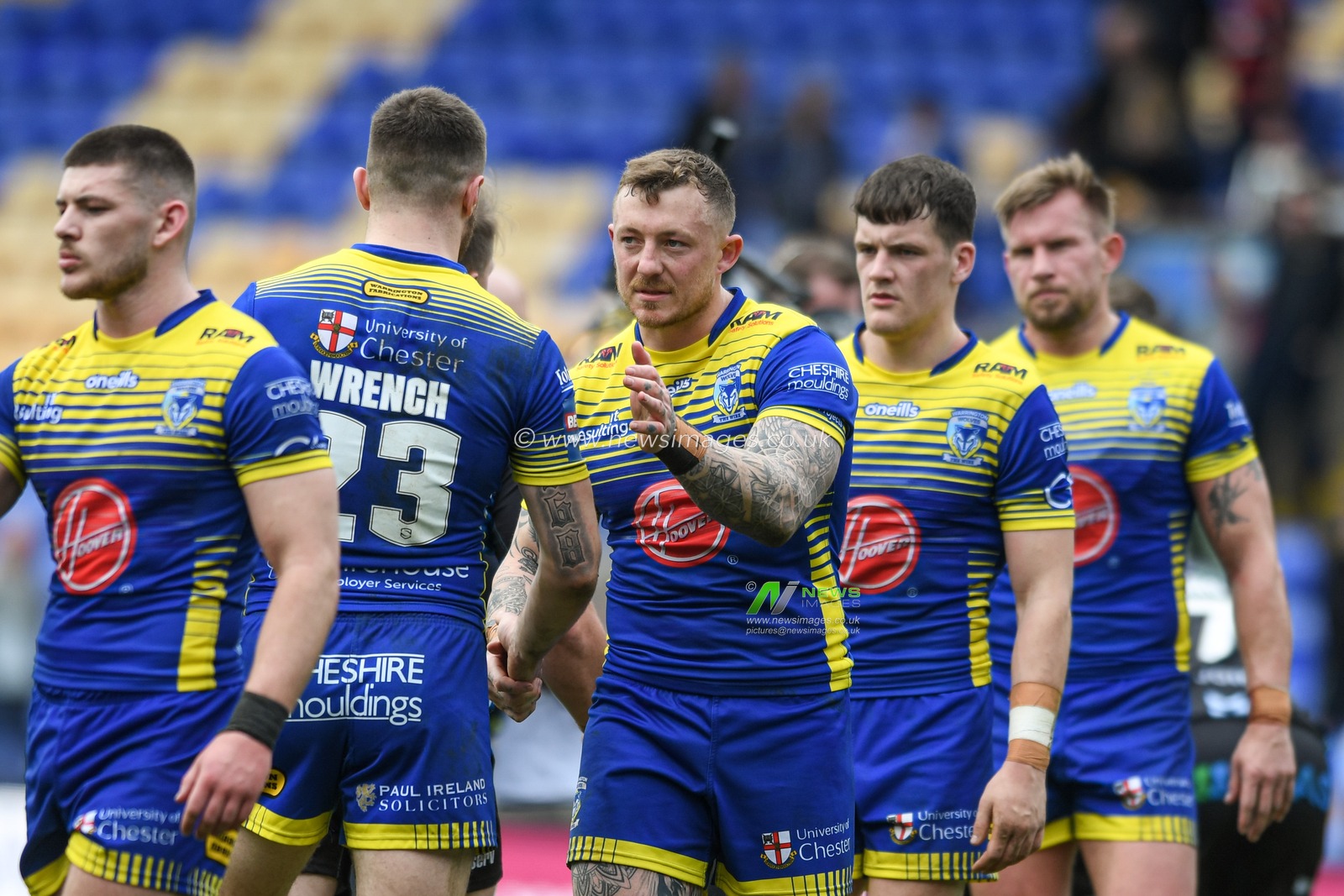 The Warrington Wolves players leave the pitch after being knocked out of the Betfred Challenge Cup by Wakefield Trinity