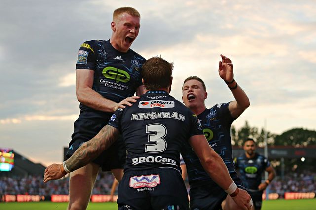 Adam Keighran of Wigan Warriors celebrates his try with Zach Eckersley of Wigan Warriors and Jai Field of Wigan Warriors during the Betfred Super League round 15 match Wakefield Trinity vs Wigan Warriors at DIY Kitchens Stadium, Wakefield, United Kingdom, 20th June 2025(Photo by Sam Eaden/News Images)