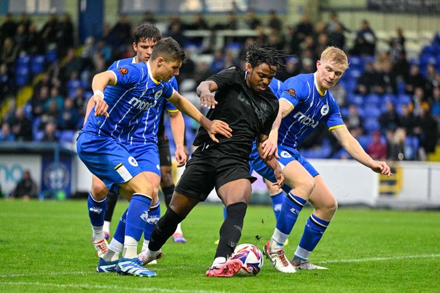Niall Ennis of Stoke City holds onto the ball while under pressure during the Pre-season friendly match Chester vs Stoke City at Deva Stadium, Chester, United Kingdom, 11th July 2024

(Photo by Cody Froggatt/News Images)