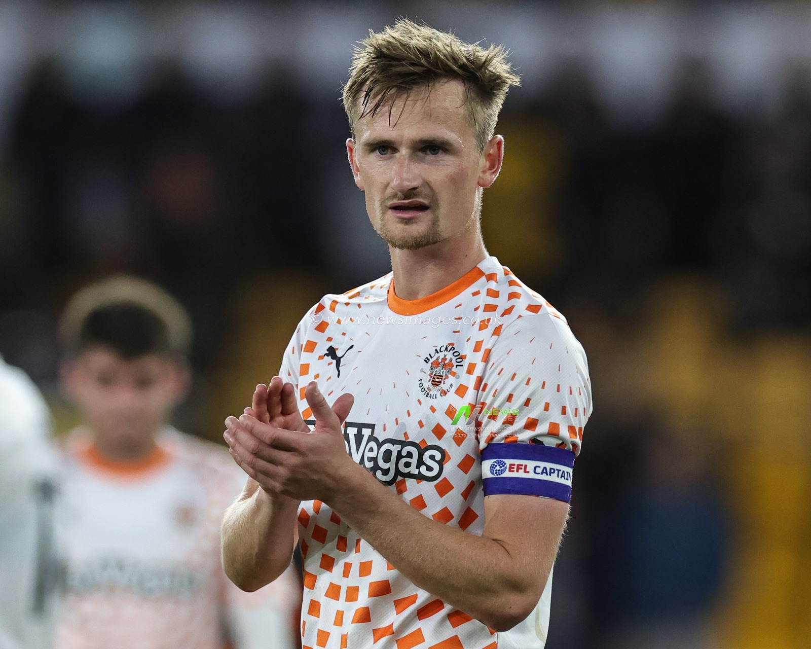 Callum Connolly #2 of Blackpool applauds the travelling fans during the Carabao Cup match Wolverhampton Wanderers vs Blackpool at Molineux, Wolverhampton, United Kingdom, 29th August 2023

(Photo by Mark Cosgrove/News Images)