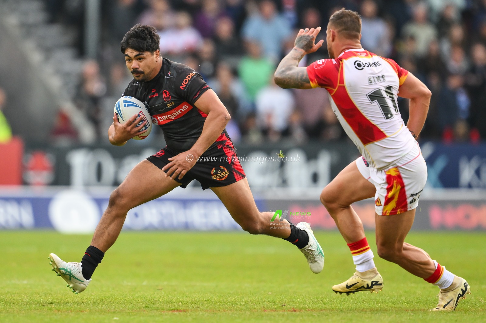 James Bell of St. Helens makes a break during the Betfred Super League Round 13 match St Helens vs Catalans Dragons at Totally Wicked Stadium, St Helens, United Kingdom, 31st May 2024

(Photo by Craig Thomas/News Images)