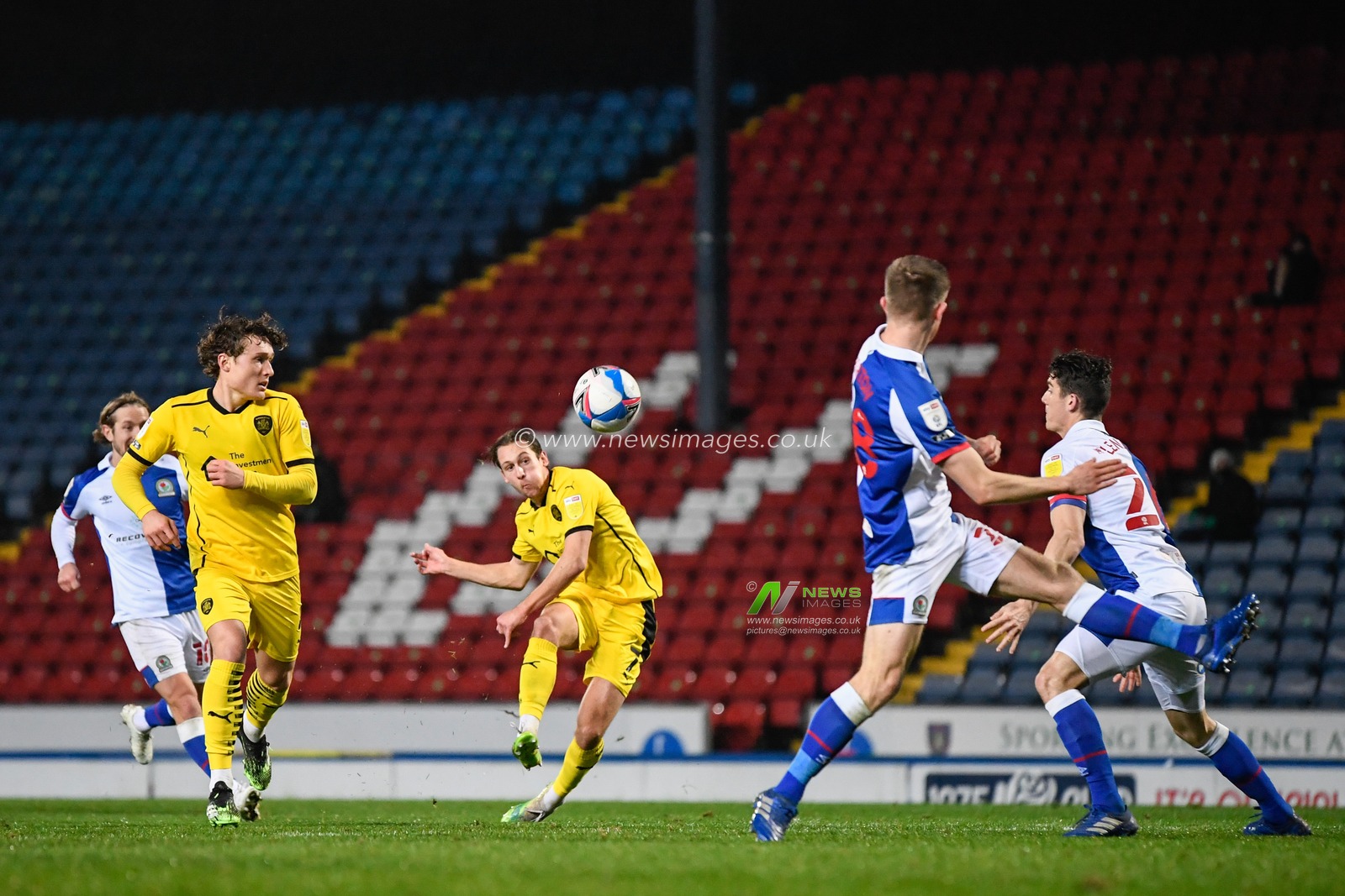 Callum Brittain #7 of Barnsley has a shot at goal