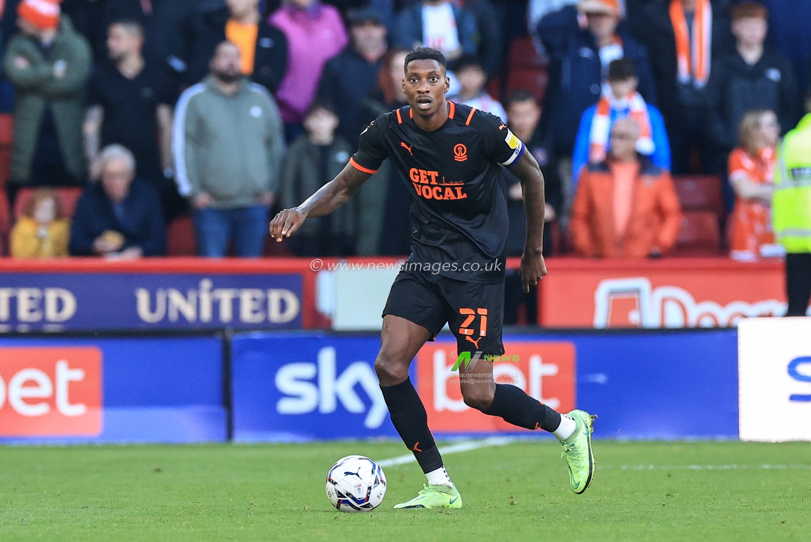Marvin Ekpiteta #21 of Blackpool in action during the game