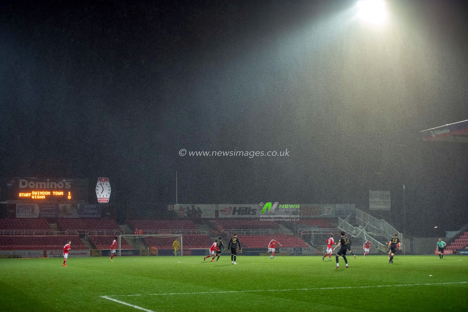 Heavy rain comes down as the 2nd half is underway at the County Ground