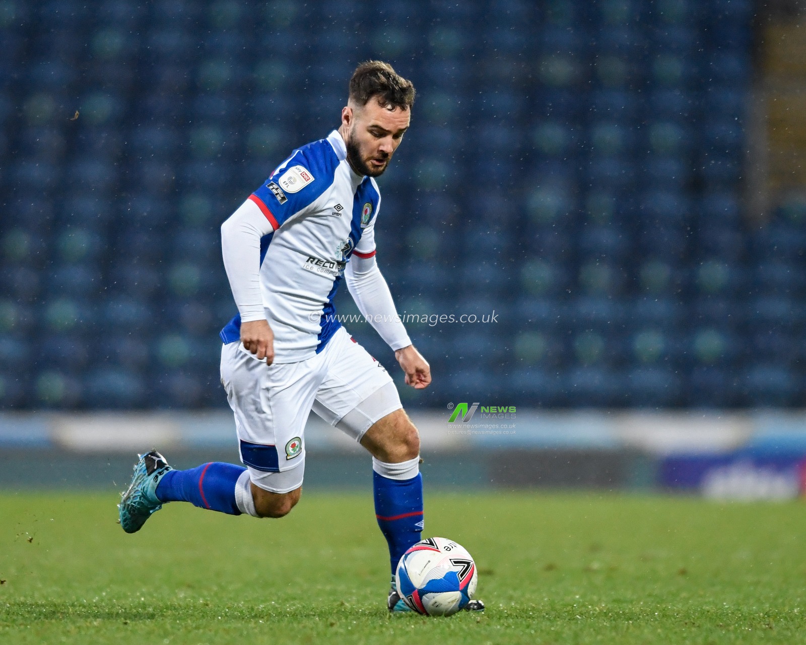 Adam Armstrong #7 of Blackburn Rovers runs with the ball