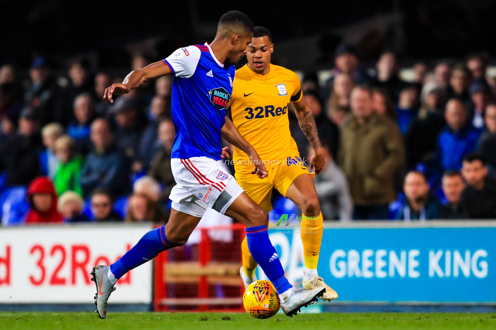 3rd November 2018, Portman Road, Ipswich, England; Sky Bet Championship Preston North End  ; Lukas Nmecha (45) of Preston is challenged by Jordan Spence (12) of Ipswich 

Credit: Georgie Kerr/News Images,

English Football League images are subject to DataCo Licence
