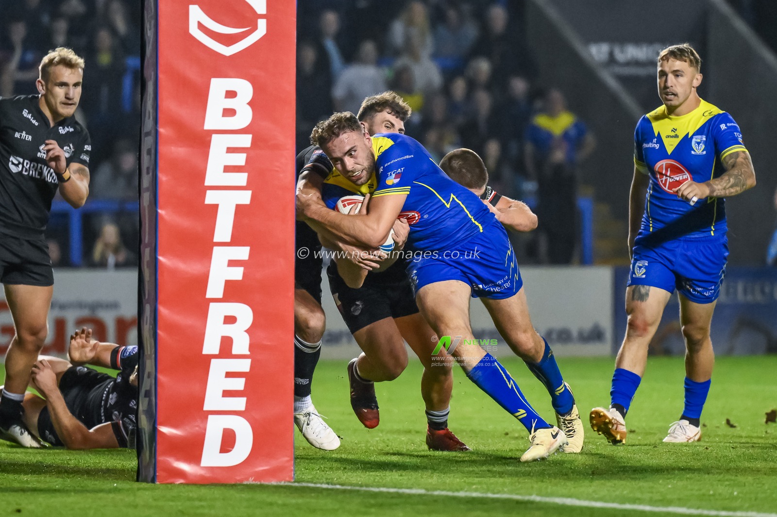 James Harrison of Warrington Wolves goes over for a try during the Betfred Super League Round 27 match Warrington Wolves vs London Broncos at Halliwell Jones Stadium, Warrington, United Kingdom, 20th September 2024

(Photo by Craig Thomas/News Images)