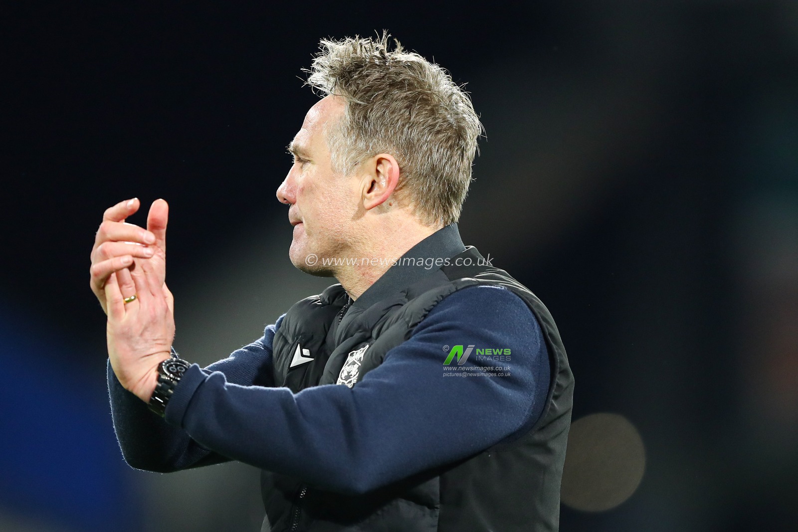Phil Parkinson manager of Wrexham clapping away support after the Sky Bet League 1 match Huddersfield Town vs Wrexham at John Smith's Stadium, Huddersfield, United Kingdom, 4th March 2025

(Photo by Jorge Horsted/News Images)