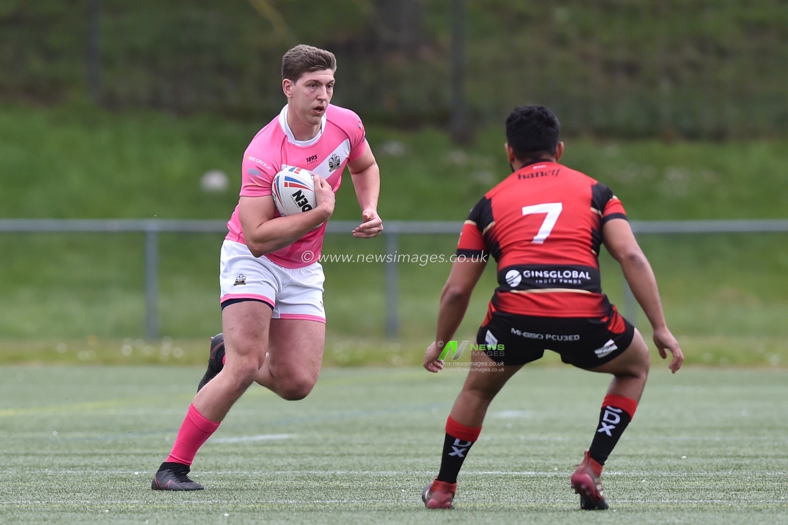 Ben Morris of North Wales Crusaders in action during the game ahead of Michael Bishay of London Skolars