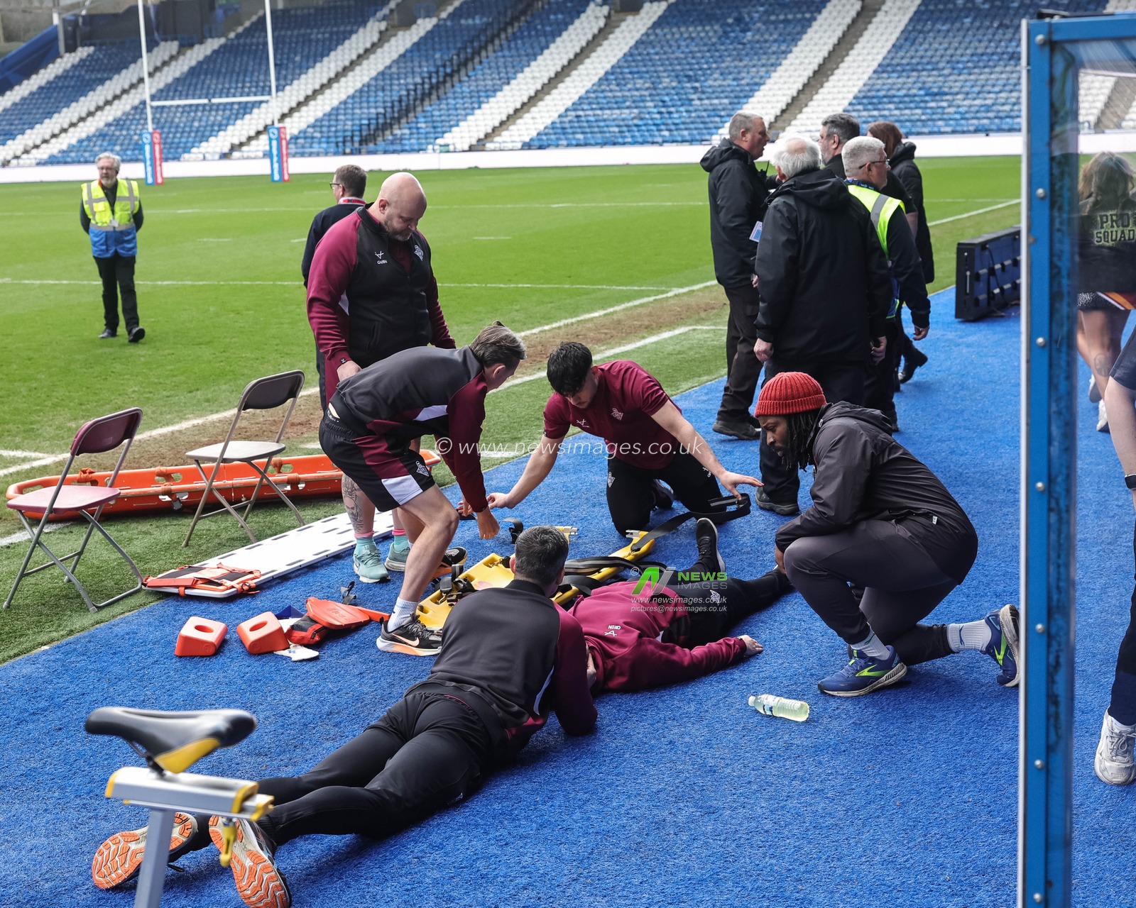 Ground staff practice first aid procedures during the Betfred Super League Round 2 match Huddersfield Giants vs Wakefield Trinity at Accu Stadium, Huddersfield, United Kingdom on 22 February 2026

(Photo by Mark Cosgrove/News Images)