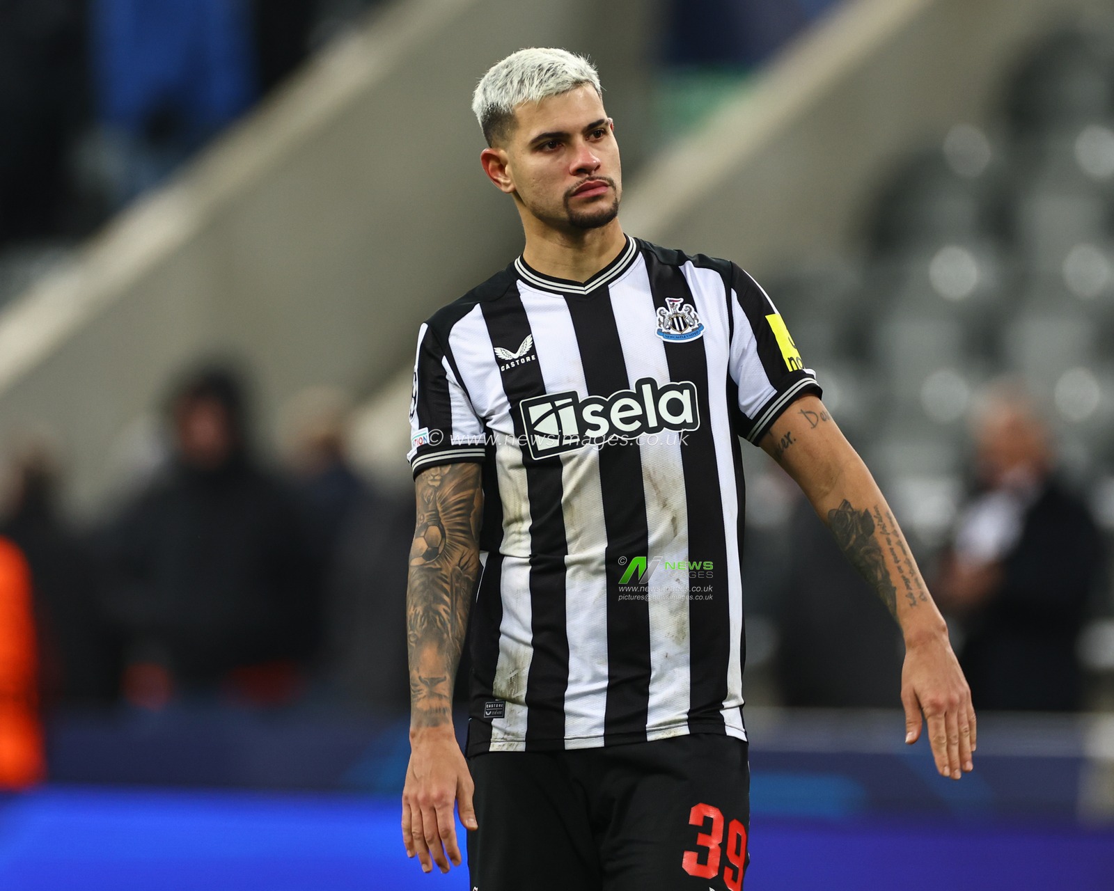 Bruno GuimarÃ£es #39 of Newcastle United acknowledges the fans during the UEFA Champions League match Newcastle United vs AC Milan at St. James's Park, Newcastle, United Kingdom, 13th December 2023

(Photo by Mark Cosgrove/News Images)