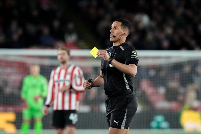 Referee Farai Hallam gives a yellow card to  Ryoya Morishita of Blackburn Rovers for dissent during the Sky Bet Championship match Sheffield United vs Blackburn Rovers at Bramall Lane, Sheffield, United Kingdom on 22 April 2026

(Photo by Maynard Manyowa/News Images)