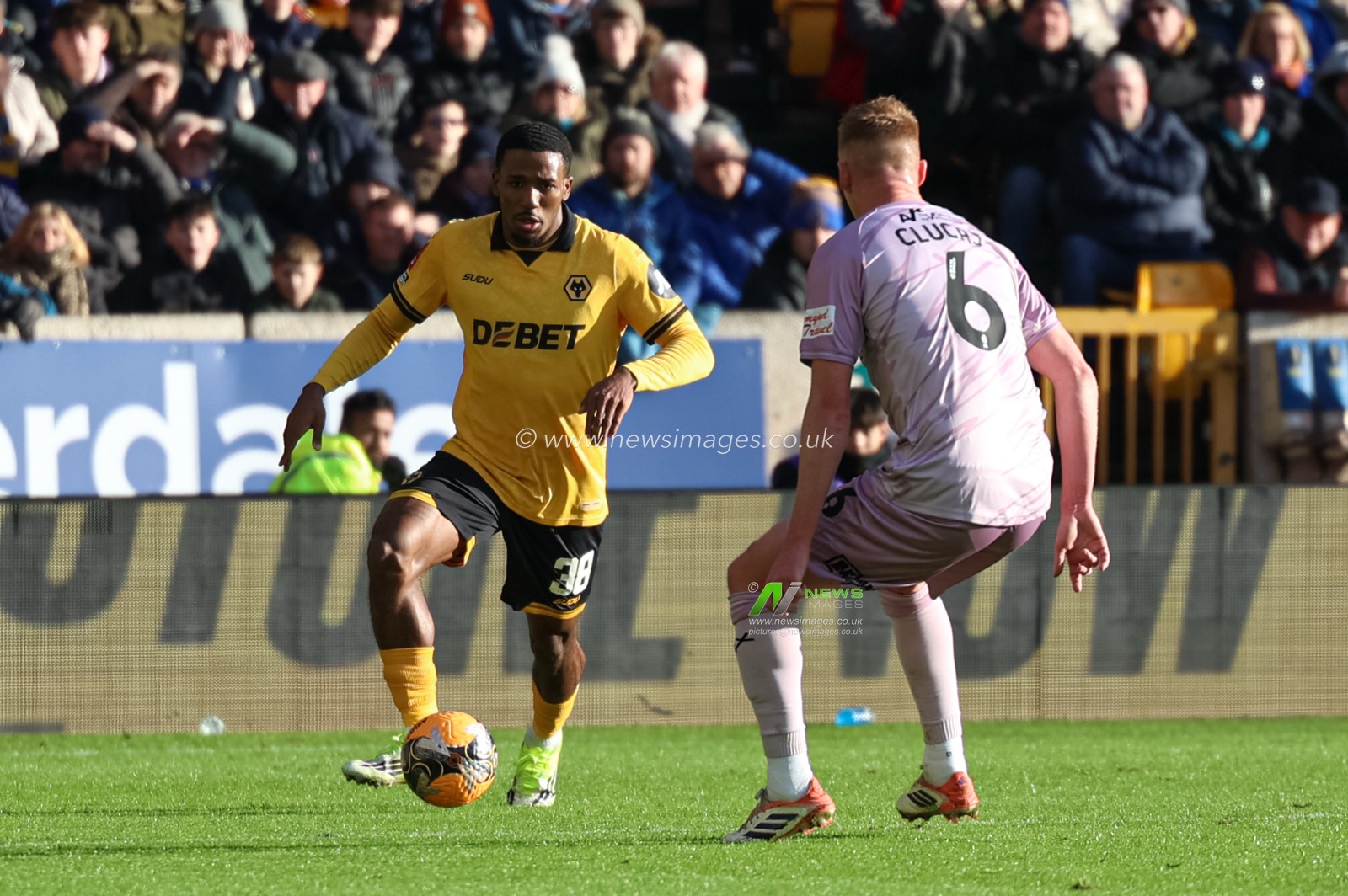 Jackson Tchatchoua of Wolverhampton Wanderers with the ball the Emirates FA Cup Third Round match Wolverhampton Wanderers vs Shrewsbury Town at Molineux, Wolverhampton, United Kingdom, 10th January 2026

(Photo by Euan Manning/News Images)