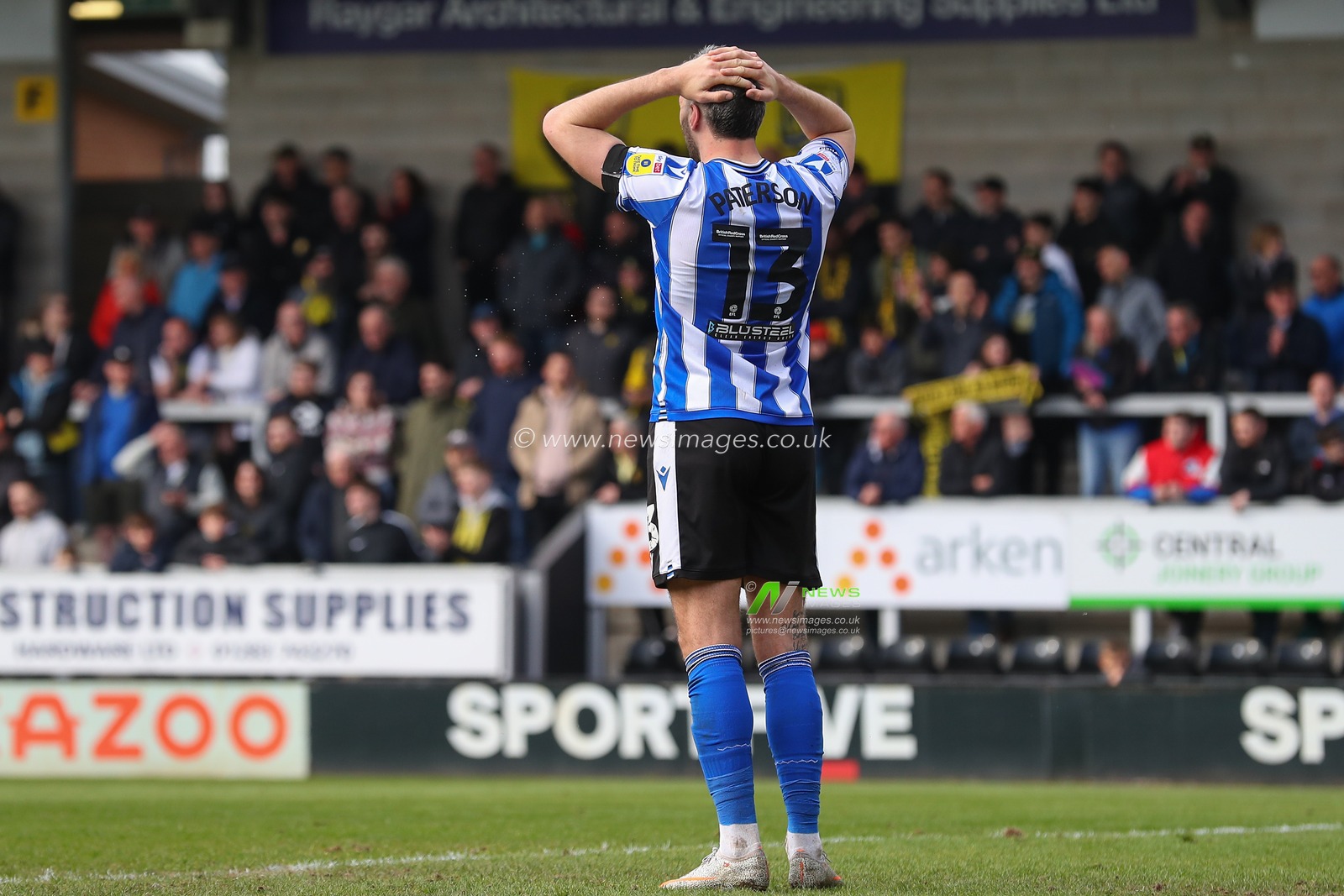 Callum Paterson #13 of Sheffield Wednesday reacts during the Sky Bet League 1 match Burton Albion vs Sheffield Wednesday at Pirelli Stadium, Burton upon Trent, United Kingdom, 15th April 2023

(Photo by Gareth Evans/News Images)