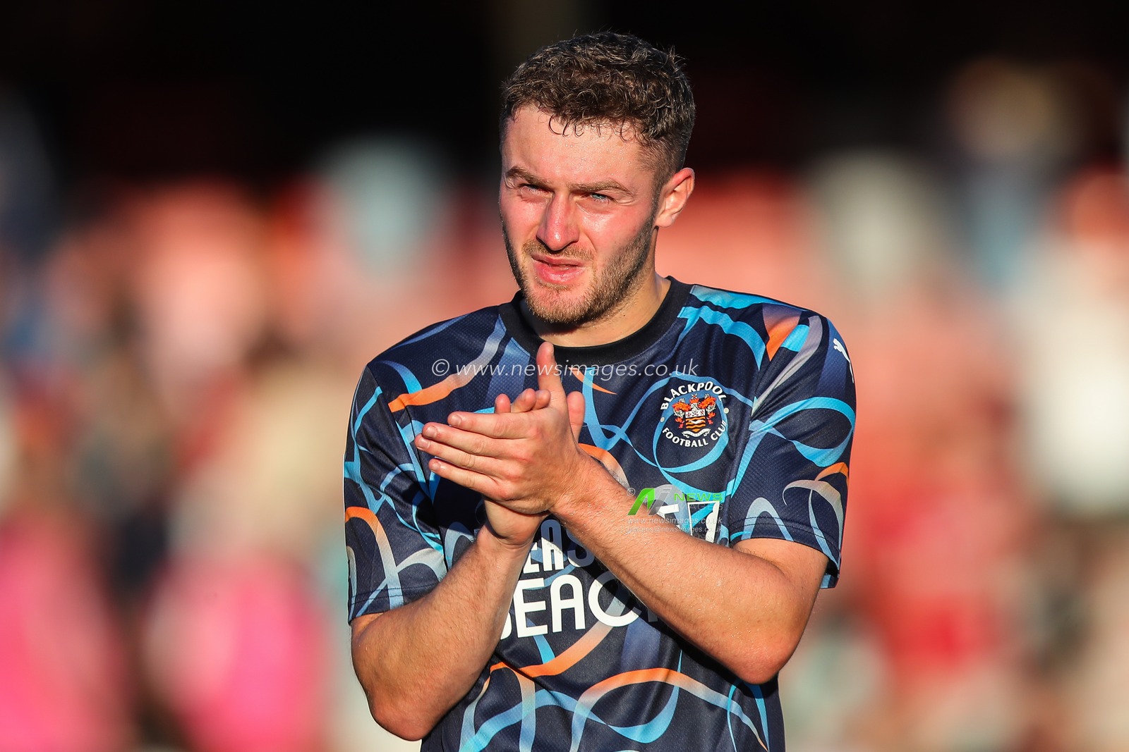 Elliot Embleton of Blackpool applauds the travelling fans after the Sky Bet League 1 match Crawley Town vs Blackpool at Broadfield Stadium, Crawley, United Kingdom, 10th August 2024

(Photo by Gareth Evans/News Images)