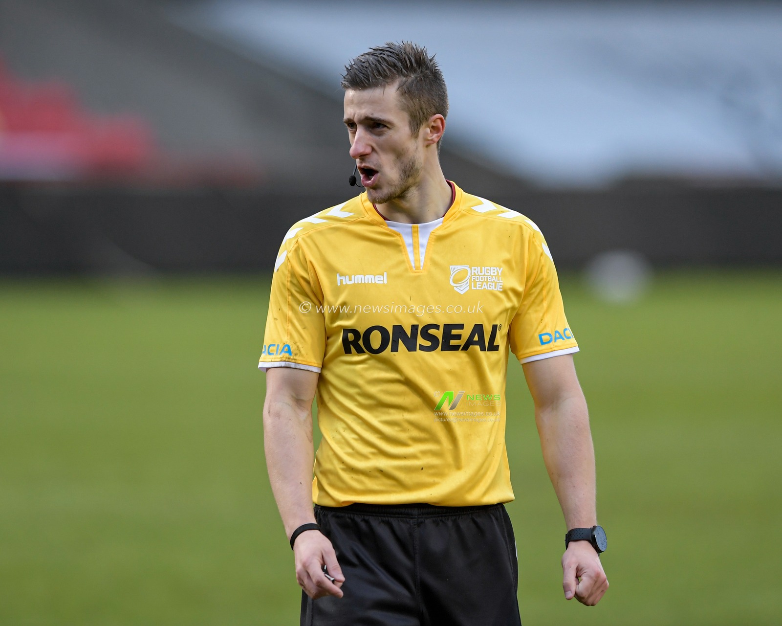 Referee Chris Kendall gives instructions during the game
