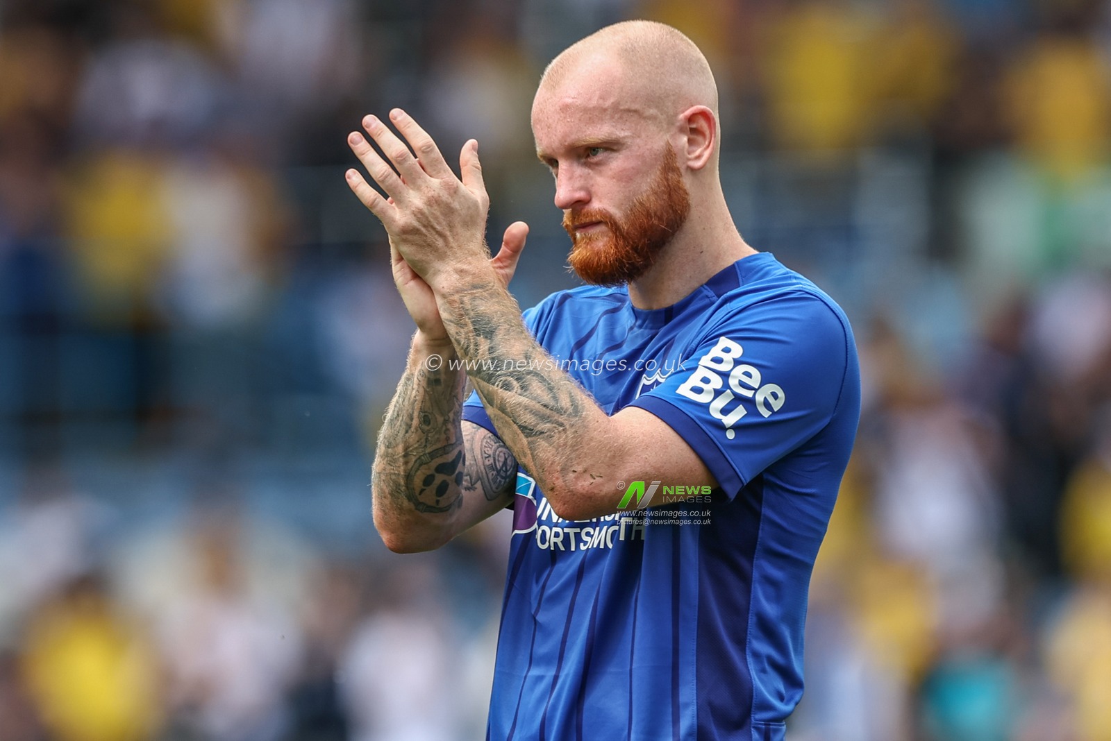 Connor Ogilvie of Portsmouth applauds the travelling fans after the game during the Sky Bet Championship match Leeds United vs Portsmouth at Elland Road, Leeds, United Kingdom, 10th August 2024

(Photo by Mark Cosgrove/News Images)