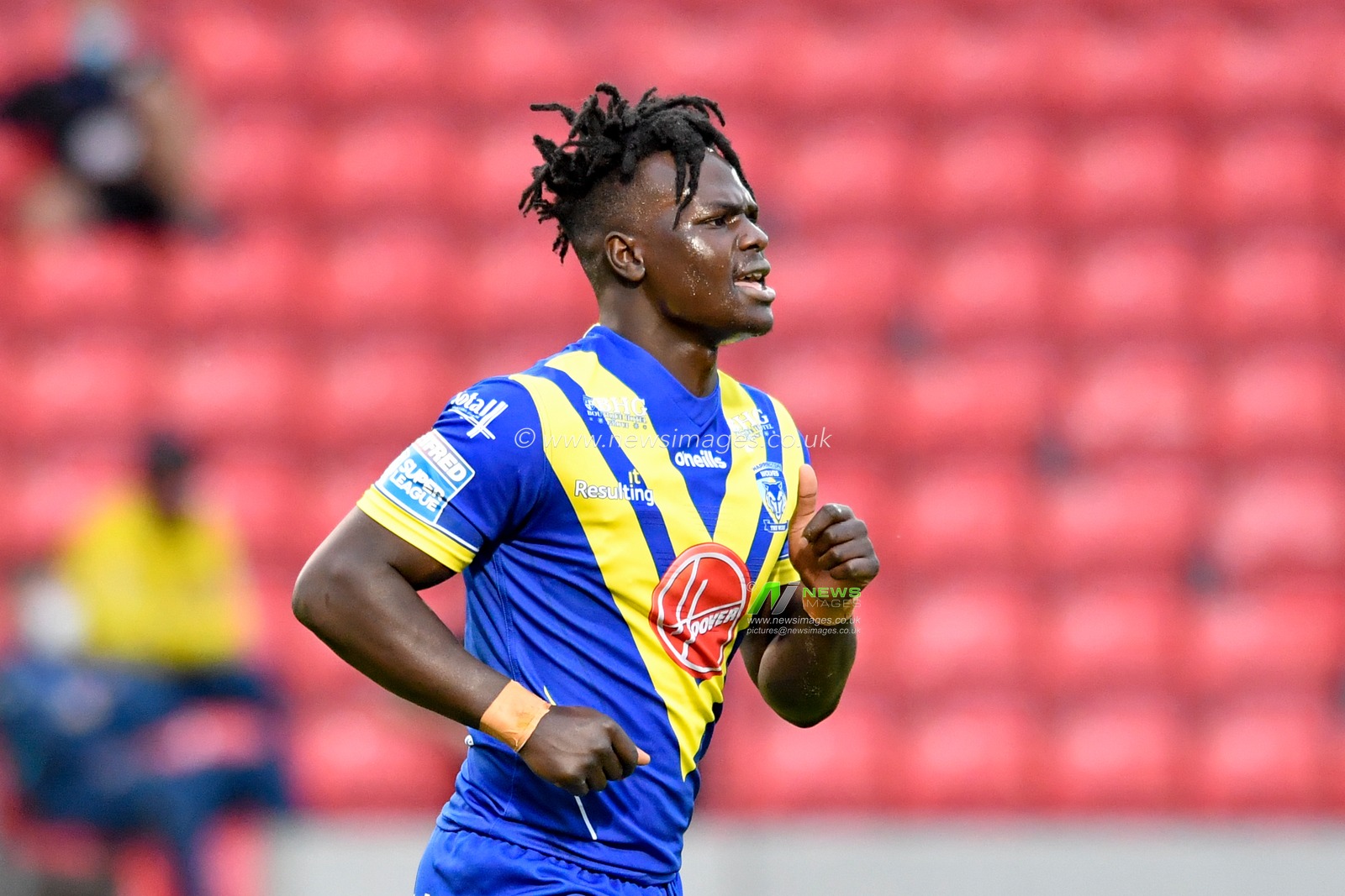 Eribe Doro (33) of Warrington Wolves in action during the game