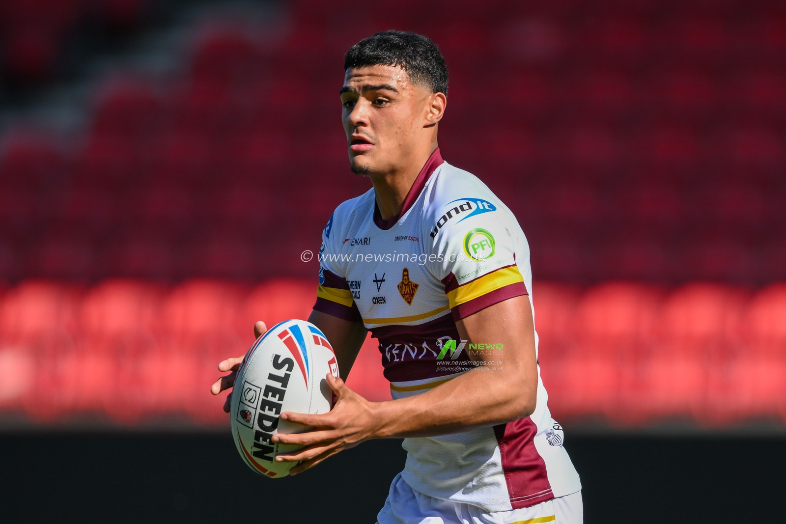 Will Pryce #32 of Huddersfield Giants makes a break during the Betfred Super League Round 7 match Salford Red Devils vs Huddersfield Giants at AJ Bell Stadium, Eccles, United Kingdom, 2nd April 2023

(Photo by Craig Thomas/News Images)