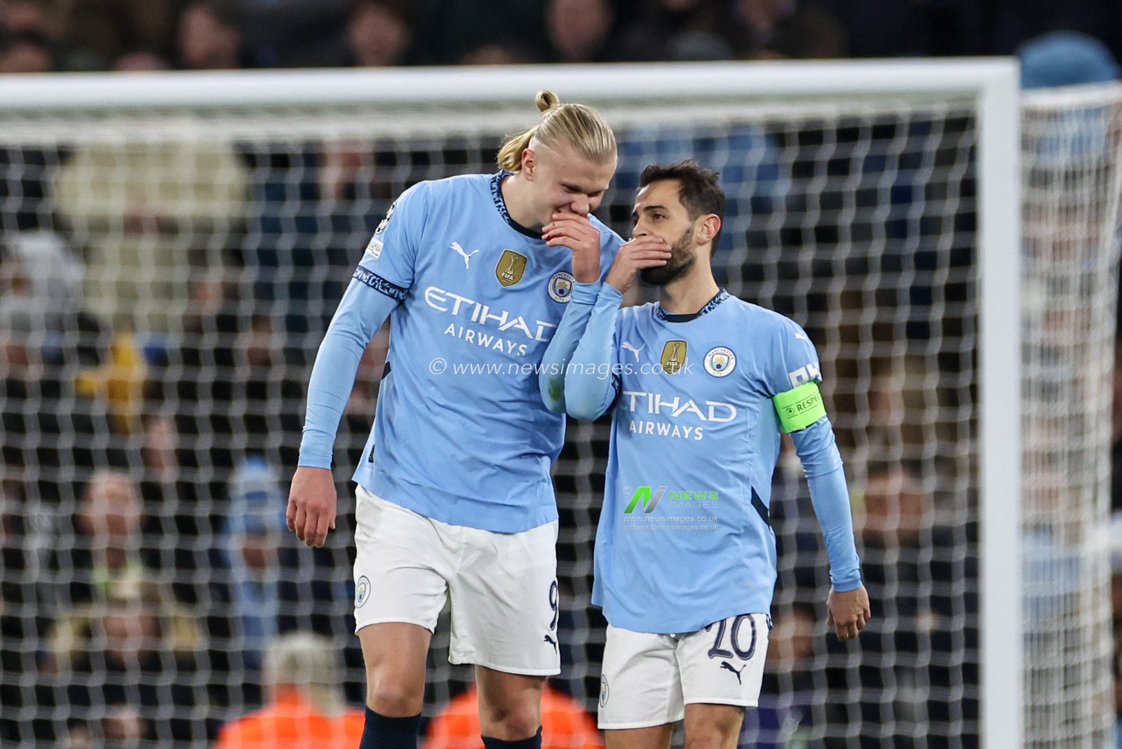 Erling Haaland of Manchester City celebrates his goal to make it 1-0 with Bernardo Silva of Manchester City during the UEFA Champions League match Manchester City vs Feyenoord at Etihad Stadium, Manchester, United Kingdom, 26th November 2024

(Photo by Mark Cosgrove/News Images)