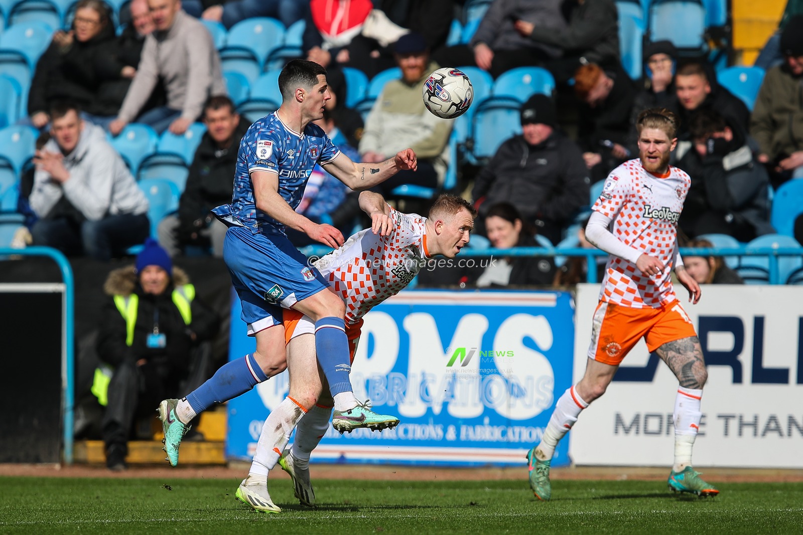Jon Mellish of Carlisle United fouls Shayne Lavery of Blackpool during the Sky Bet League 1 match Carlisle United vs Blackpool at Brunton Park, Carlisle, United Kingdom, 13th April 2024

(Photo by Gareth Evans/News Images)