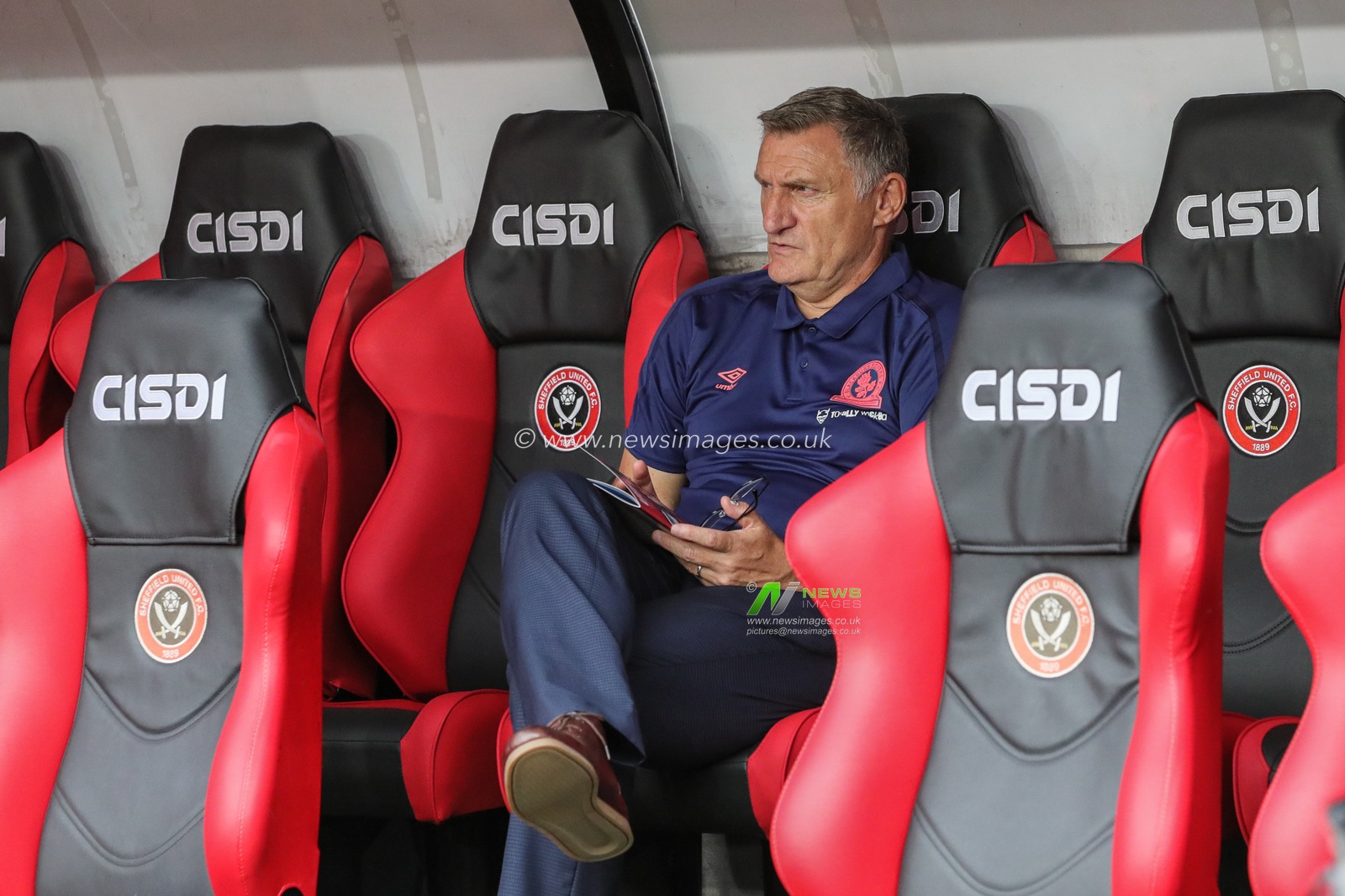 27th August 2019 , Bramall Lane, Sheffield, England; Carabao Cup Football, Second Round, Sheffield United vs Blackburn Rovers ; Blackburn Rovers Manager Tony Mowbray reads todays program as his team warm up 


Credit: Mark Cosgrove/News Images

English Football League images are subject to DataCo Licence