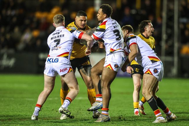 Renouf Atoni of Castleford Tigers is tackled by Rowan Milnes of Bradford Bulls and Leon Ruan of Bradford Bulls during the Betfred Super League round 6 match Castleford Tigers vs Bradford Bulls at OneBore Stadium, Castleford, Untied Kingdom on 26 March 2026

(Photo by Alfie Cosgrove/News Images)