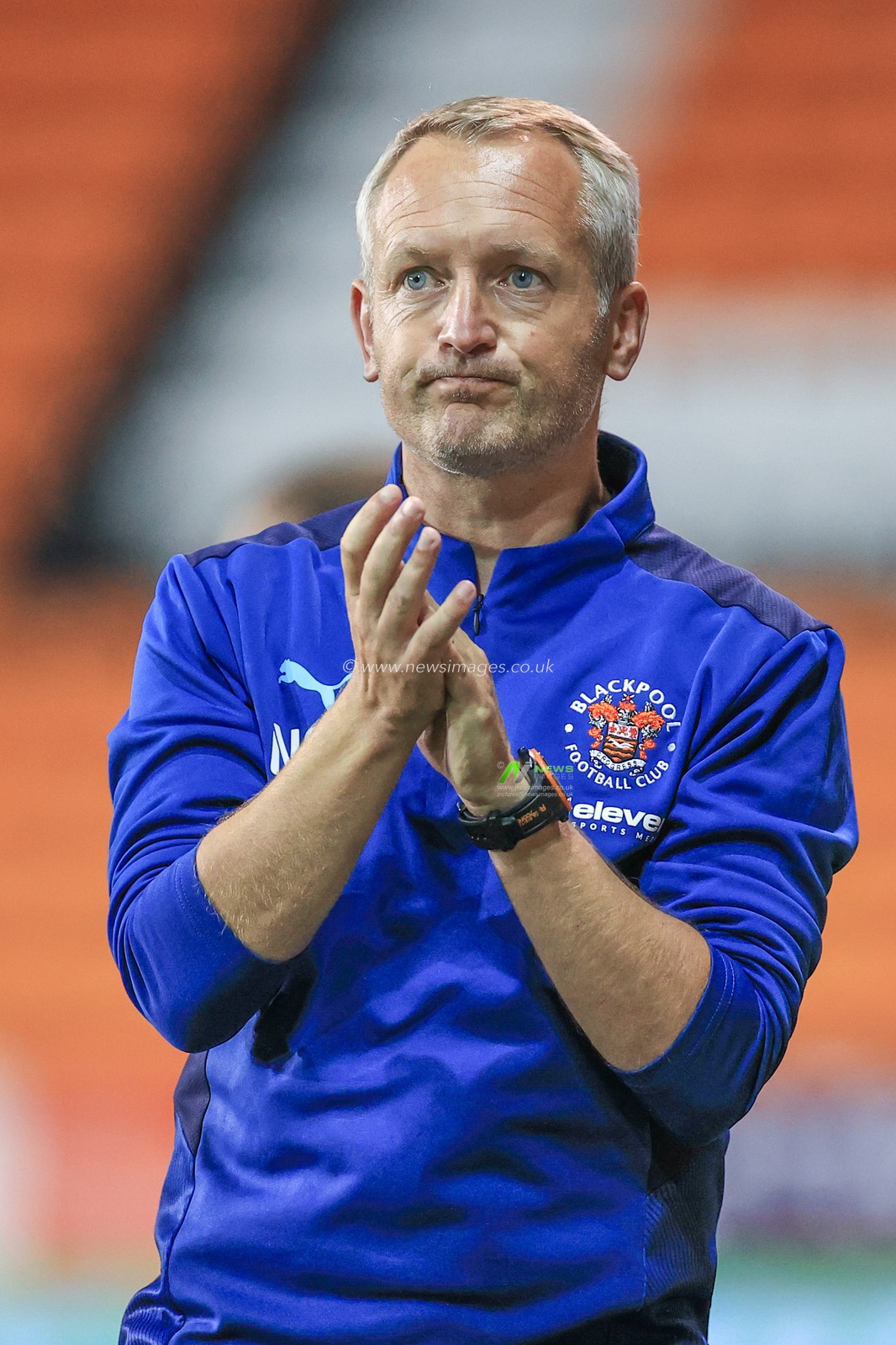 Neil Critchley Head Coach of Blackpool applauds his players